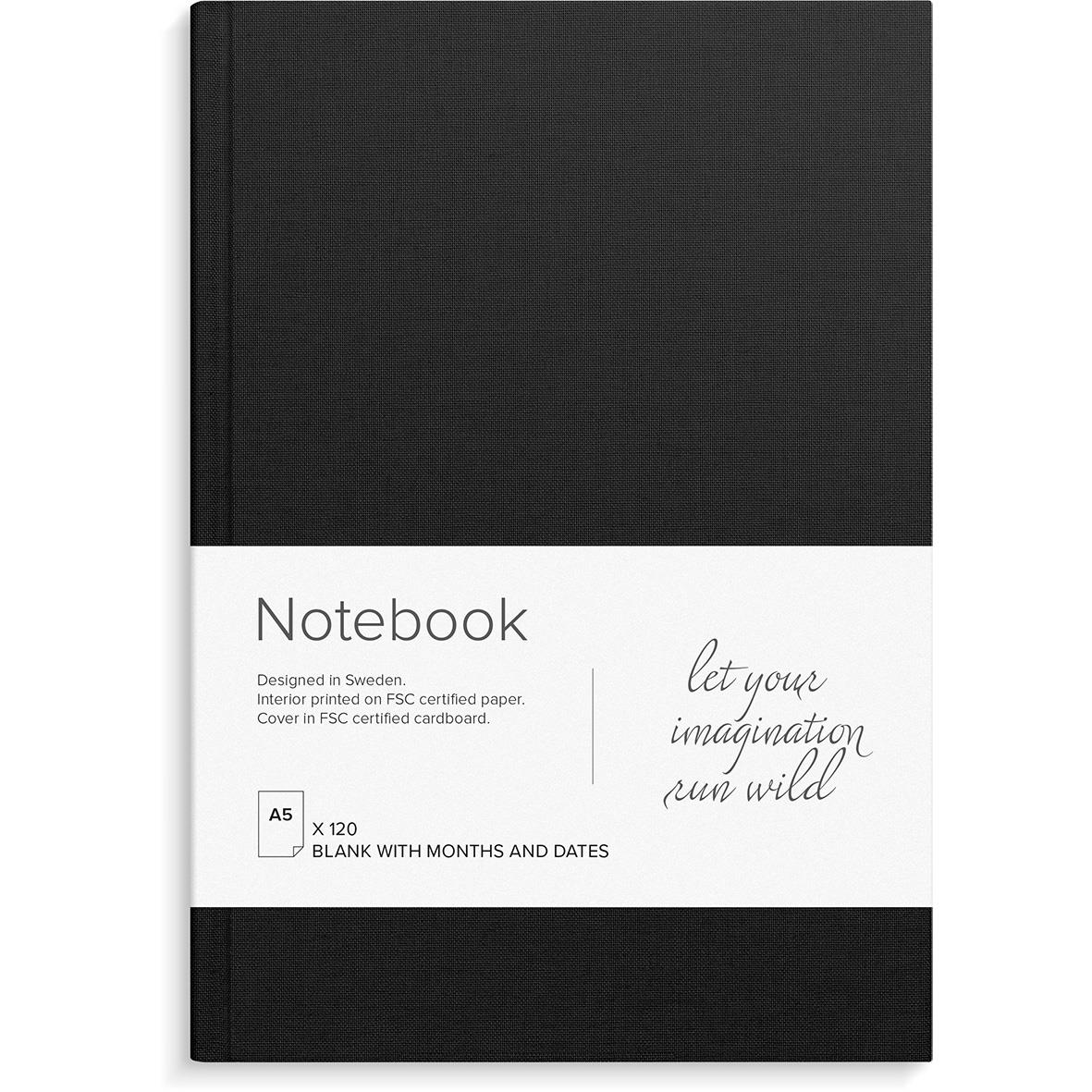 Svart anteckningsbok med vit etikett som säger Notebook och let your imagination run wild