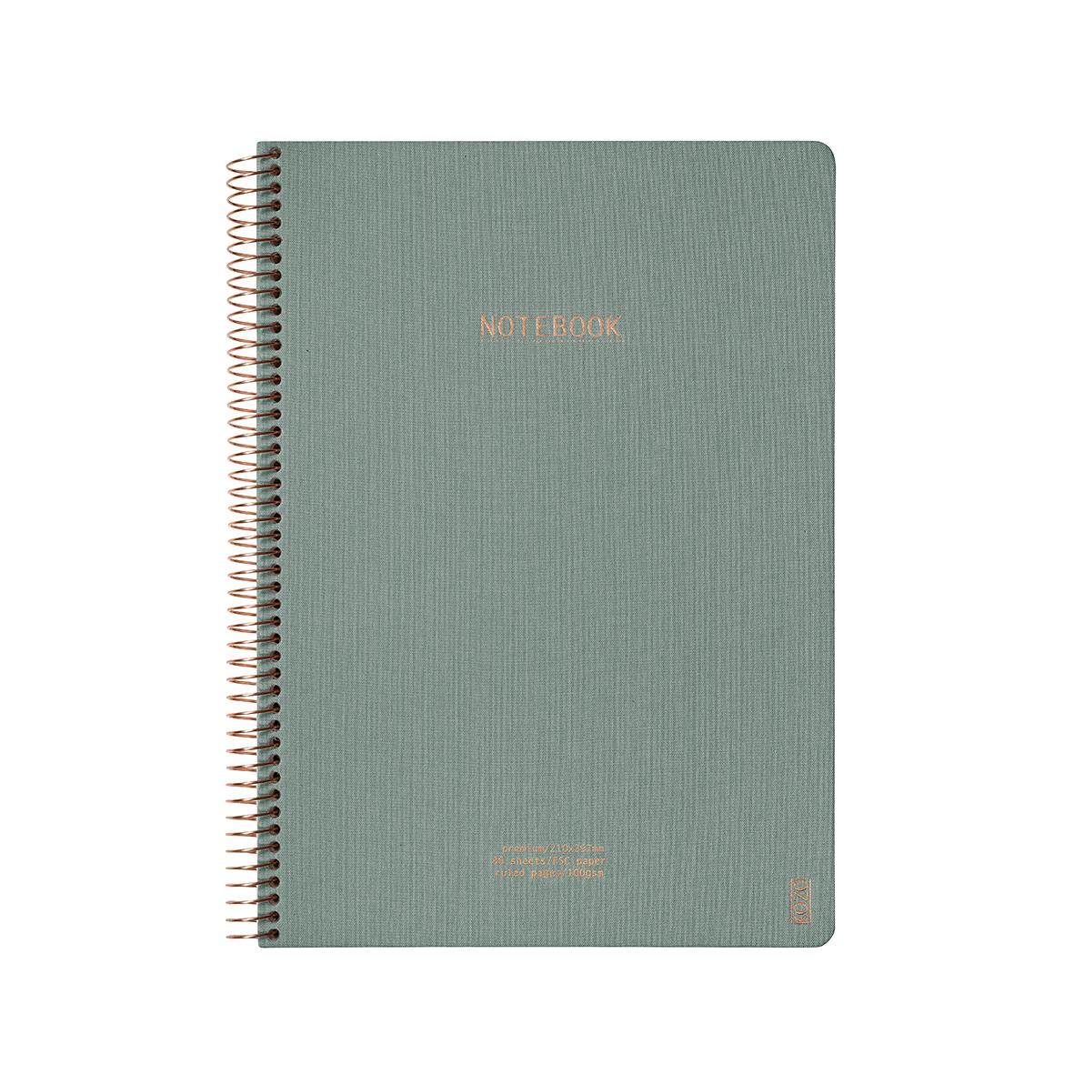 Blågrå anteckningsbok med spiralrygg och texten NOTE BOOK på framsidan