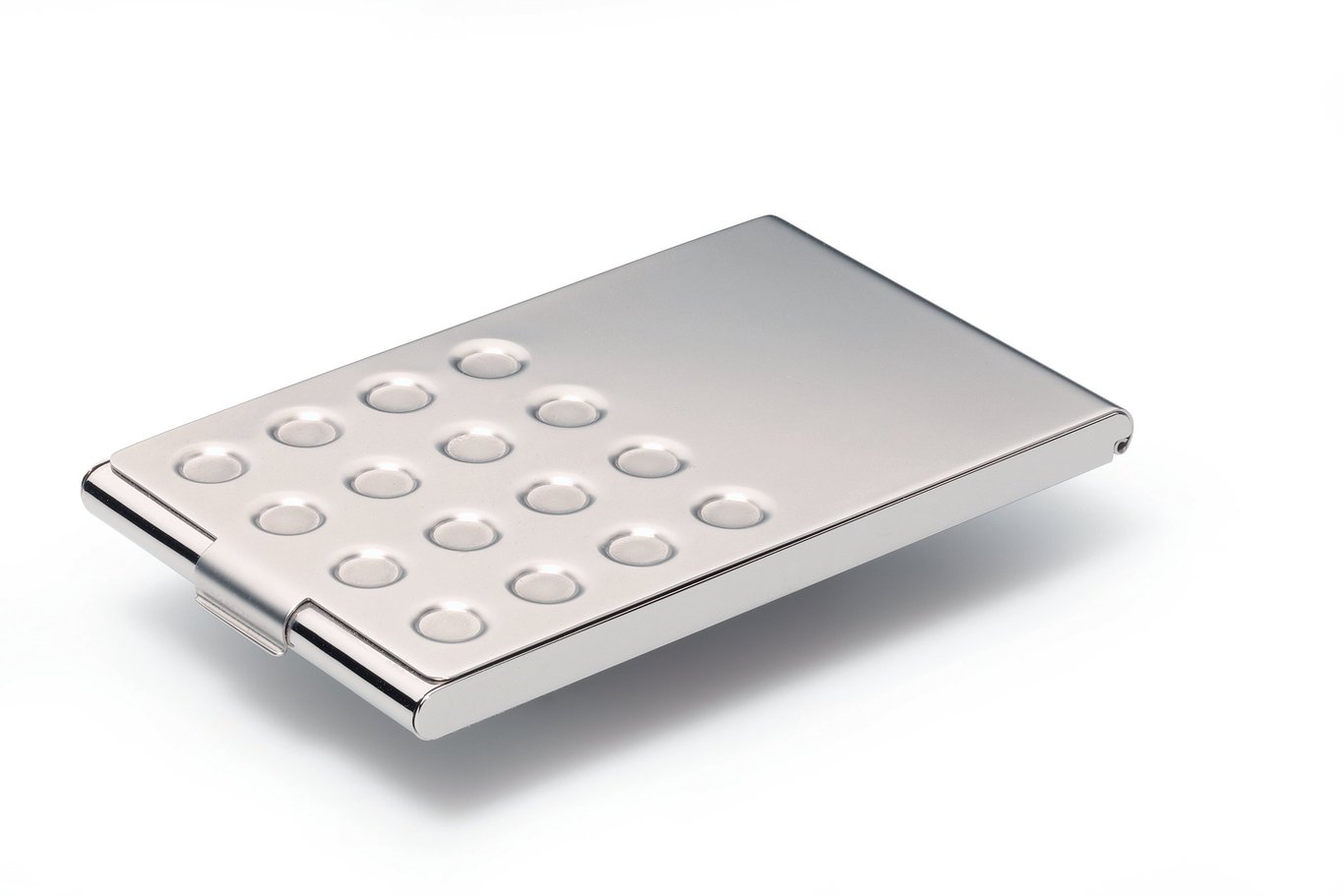 Elegant metallisk visitkortshållare med rundade knappar på framsidan