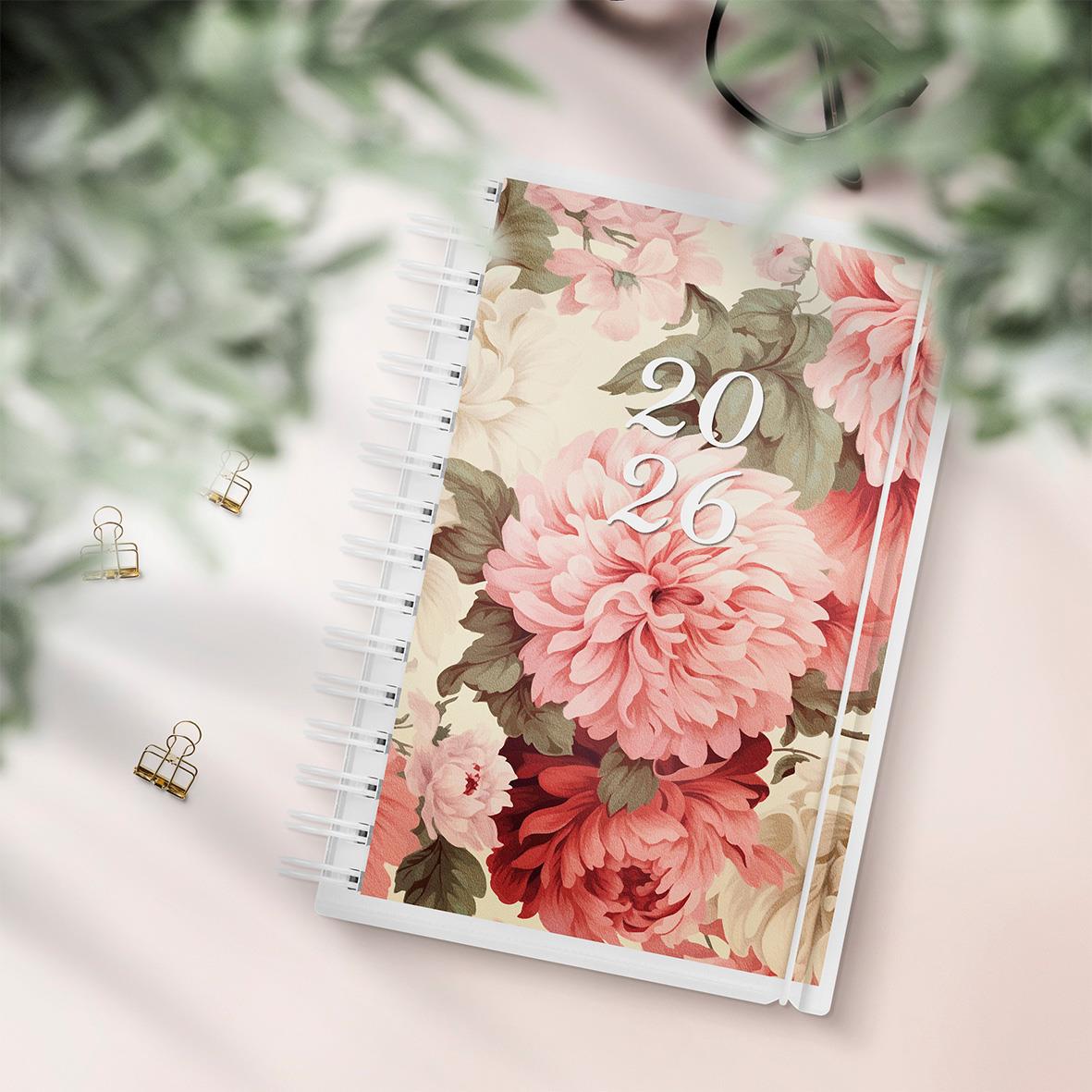 Blommig 2026 års dagbok med spiralbindning och omslag med rosa och gröna blommor