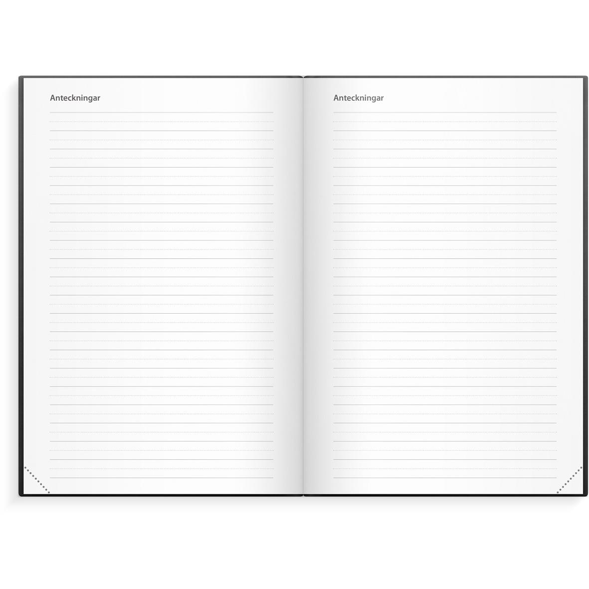 Svart 2025 dagbok i konstläder med inbindning och kalender för 2026, placerad på vit yta med penna, koppar och gröna blad