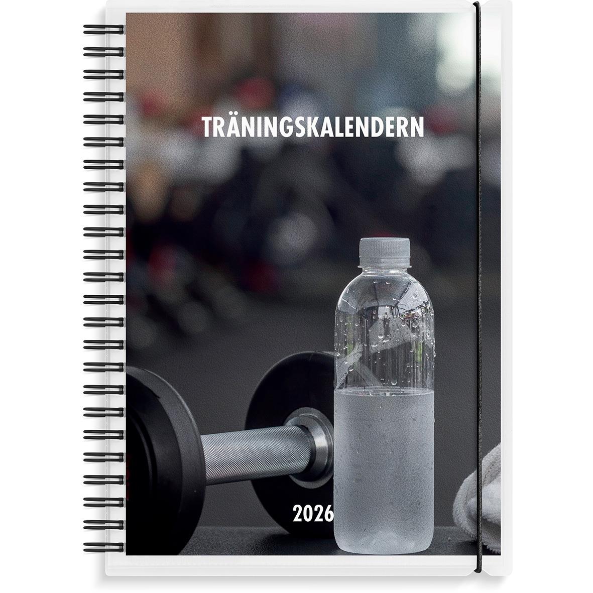 A5 träningskalender för 2026 med spiralrygg, vattenflaska och hantlar på framsidan