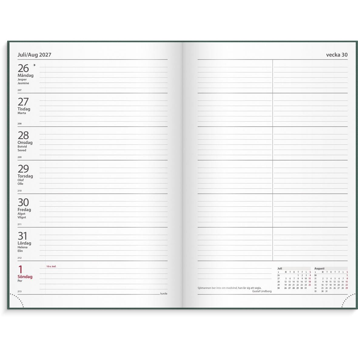 Grön kontorskalender för 2026 med rosa omslag och guldtext, omgiven av penna, klämmor, kopp kaffe och gröna växter