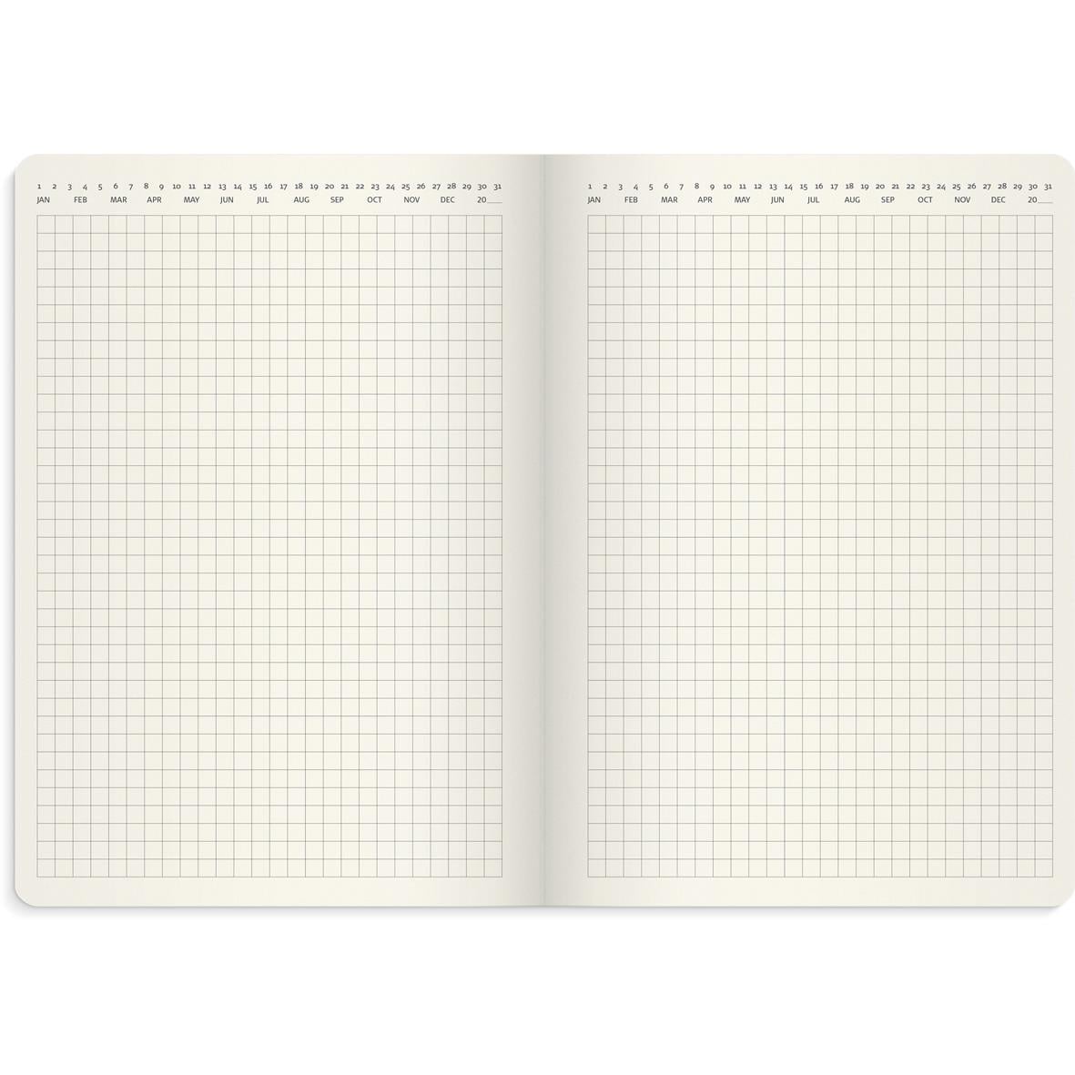 Öppnad stor veckokalender i A5-format med tomma sidor för 2026