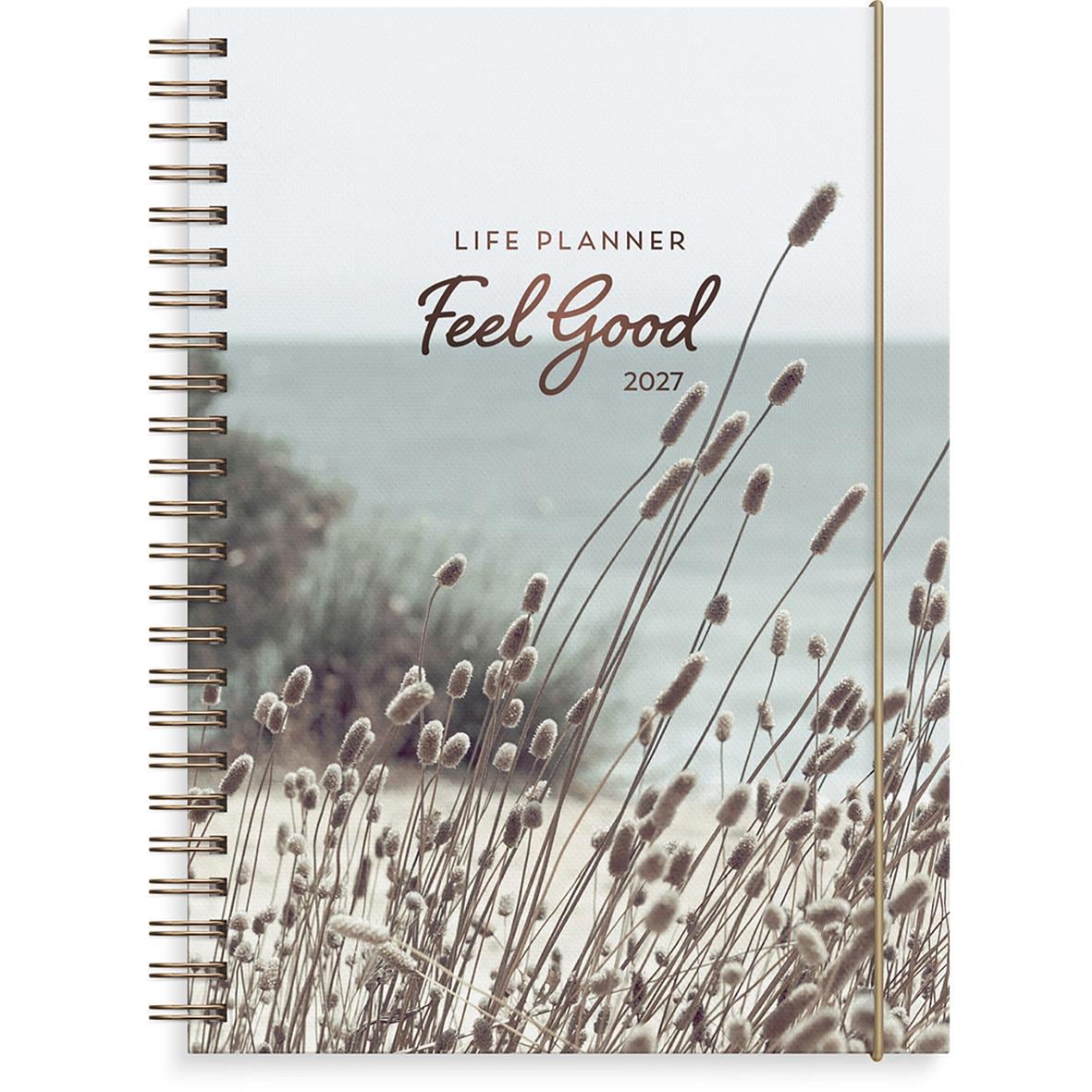 Årsplanerare Feel Good 2026 i A5-format med bild av strand och gräs
