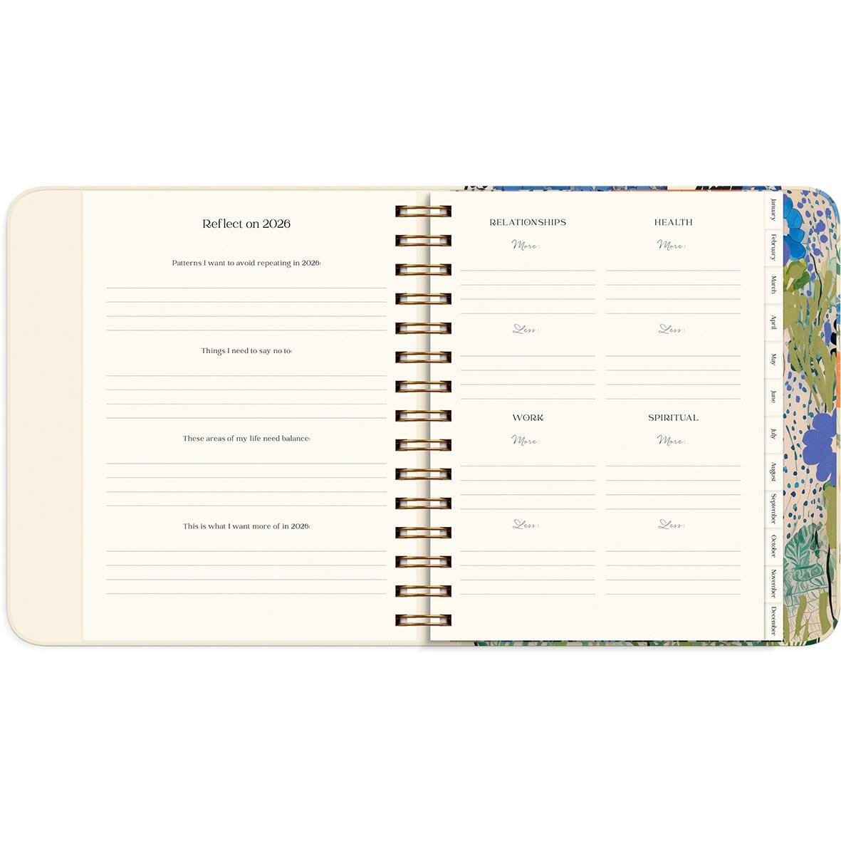 Öppen almanacka för 2026 med reflektioner och hälsomål för året, spiralbindning och färgglada kanter