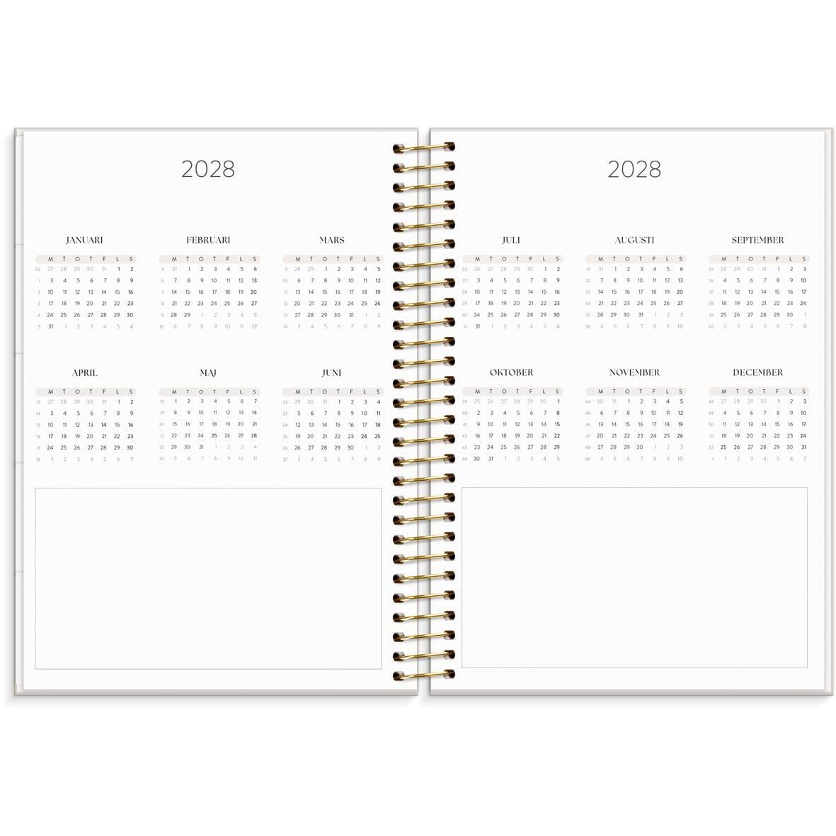 Öppnad almanacka för 2028 med kalender för varje månad och plats för anteckningar i A5-format