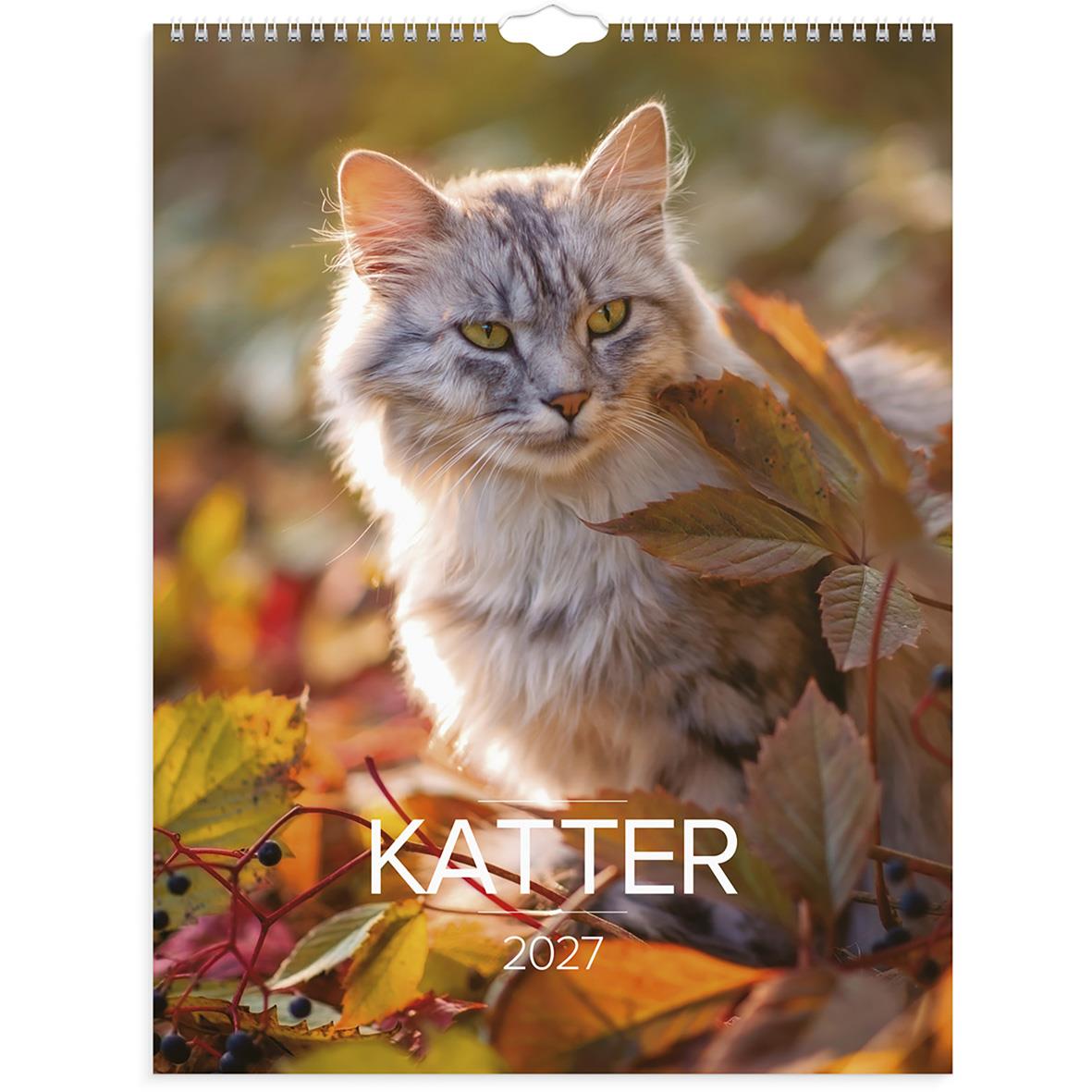 Väggkalender med bild av en grå och vit katt bland gröna växter för 2026