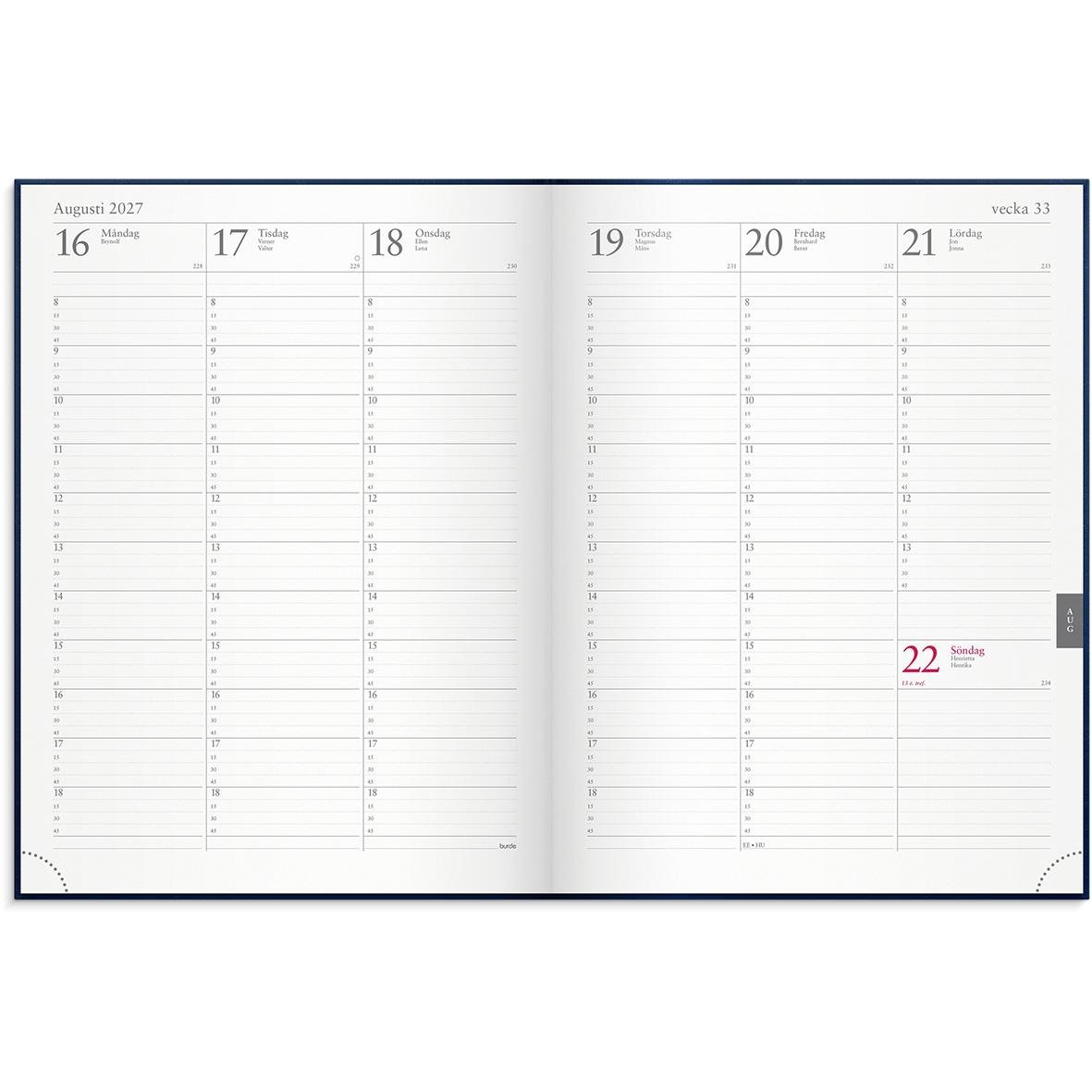 Öppnad veckojournal för augusti 2027 med veckoplanering i mörkblå konstläderinbunden omslag