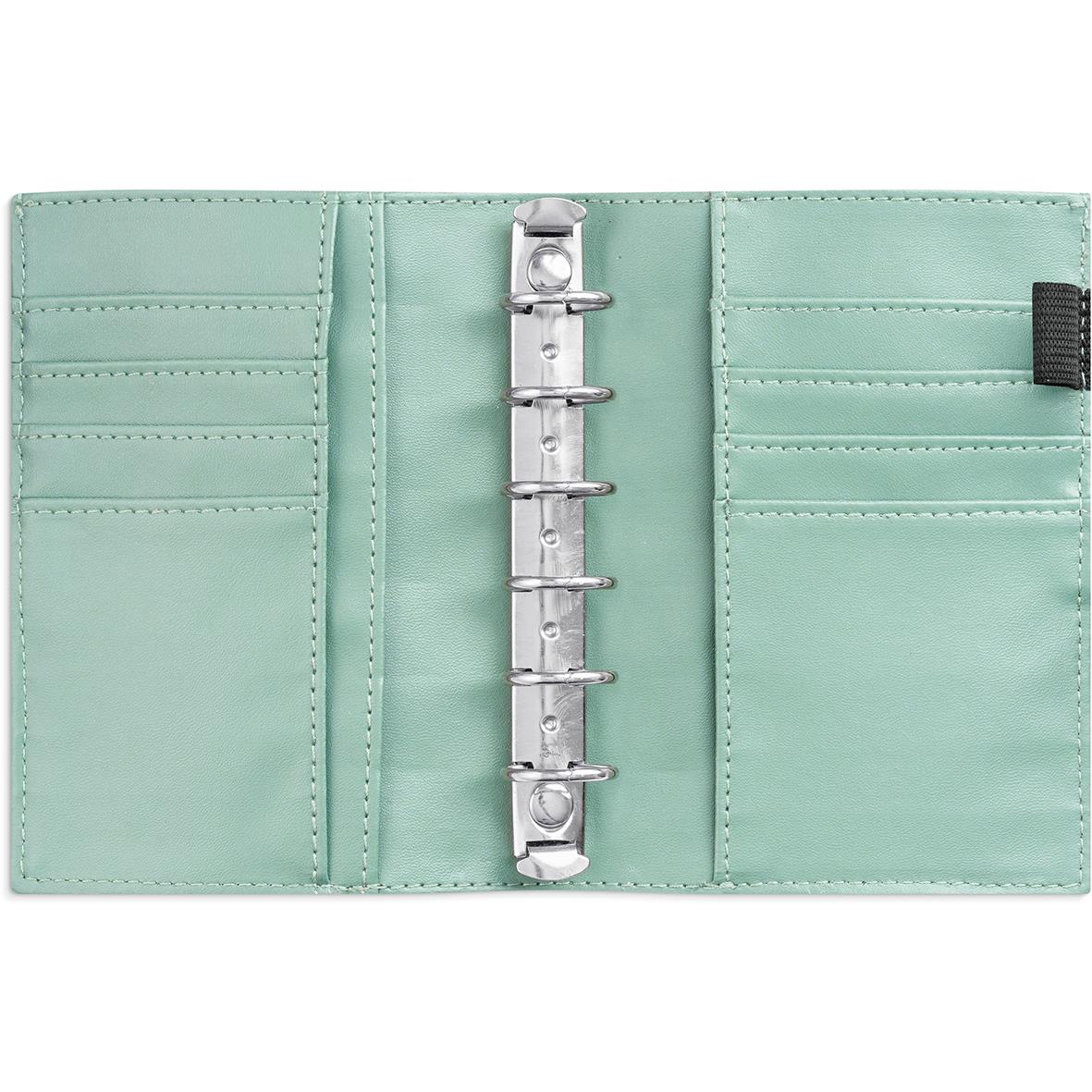 Grön systemkalender i konstläder med ringbind för 2024