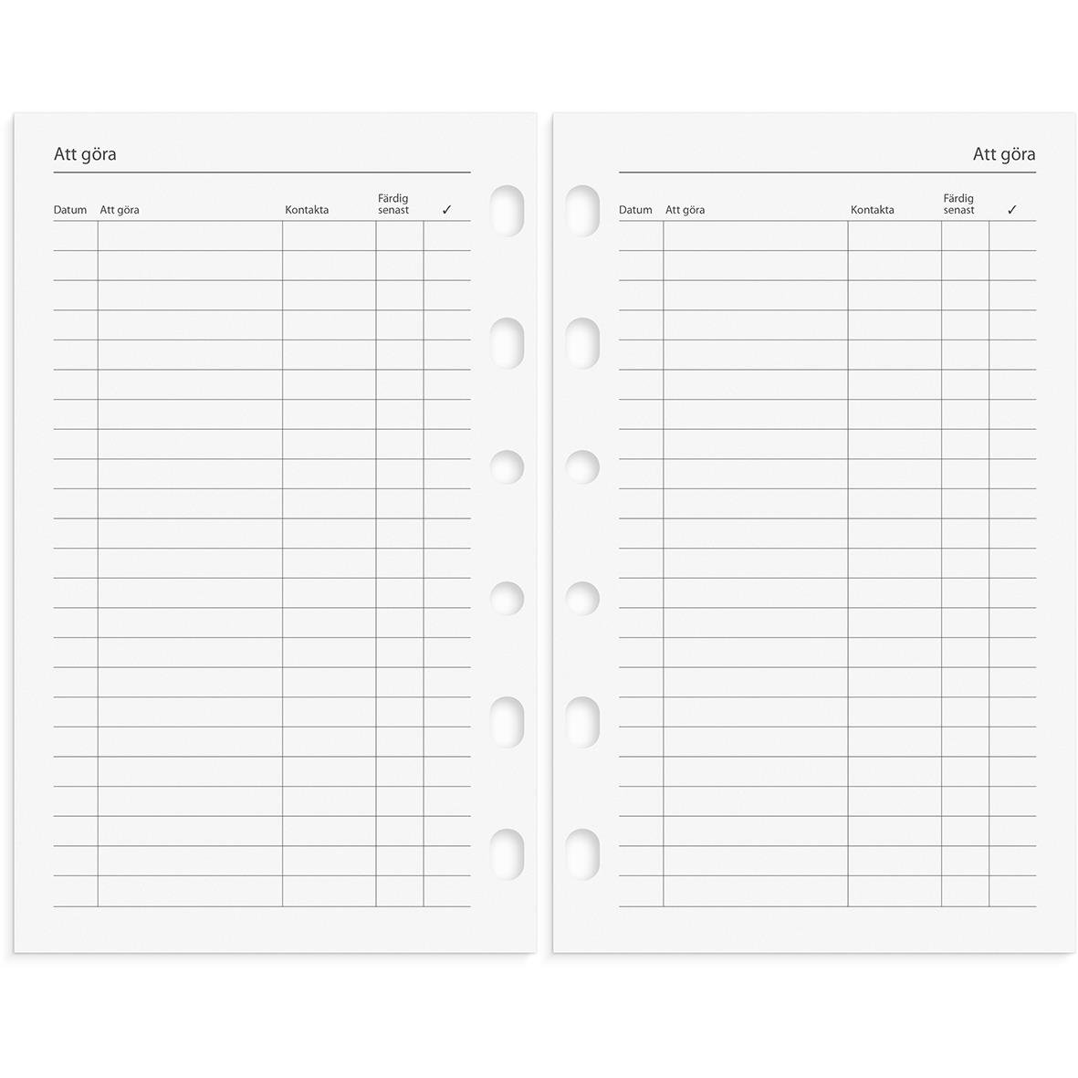 Öppnad systemkalender för 2024 med tomma rader för anteckningar, grön konstläderomslag