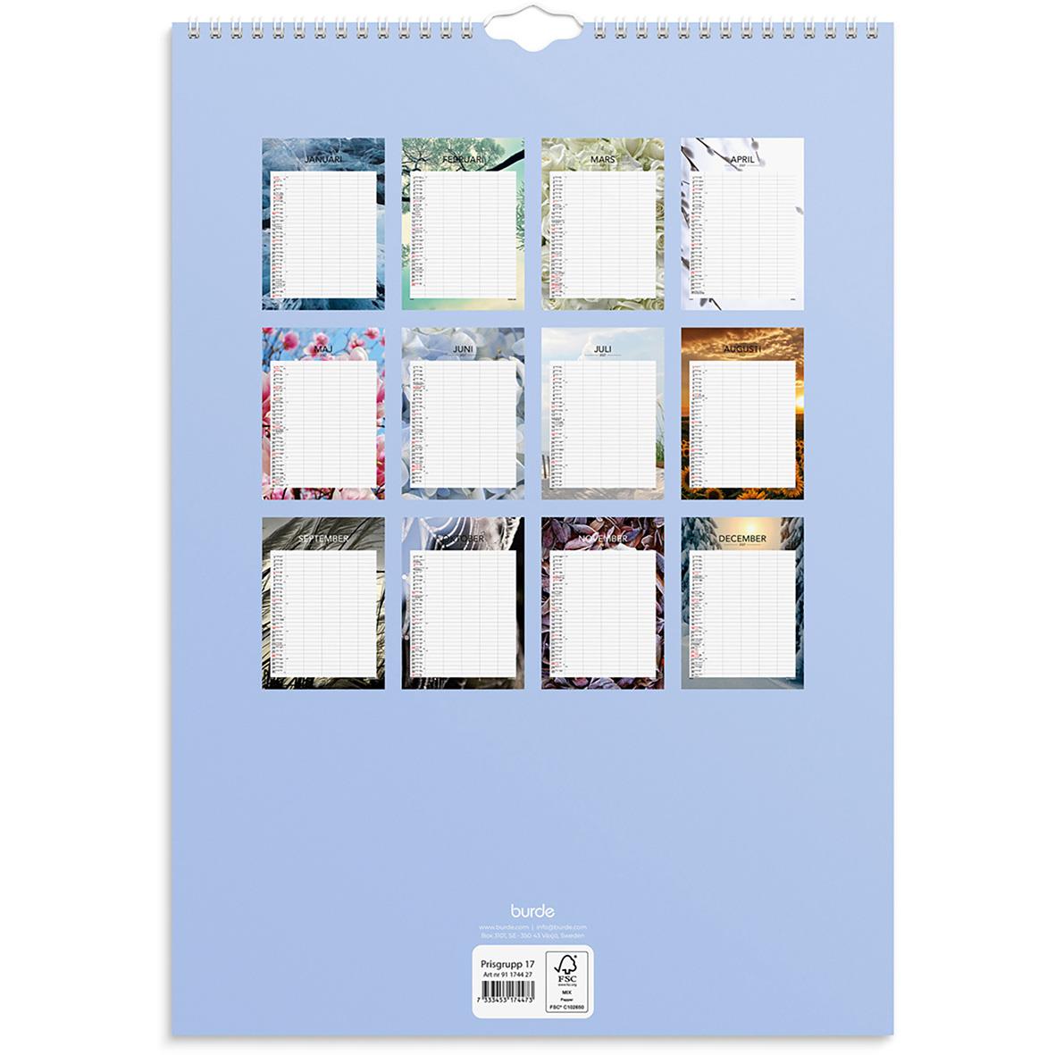 Kalenderblad med olika mönster och färger på varje sida, upphängningshake upptill, på blå bakgrund