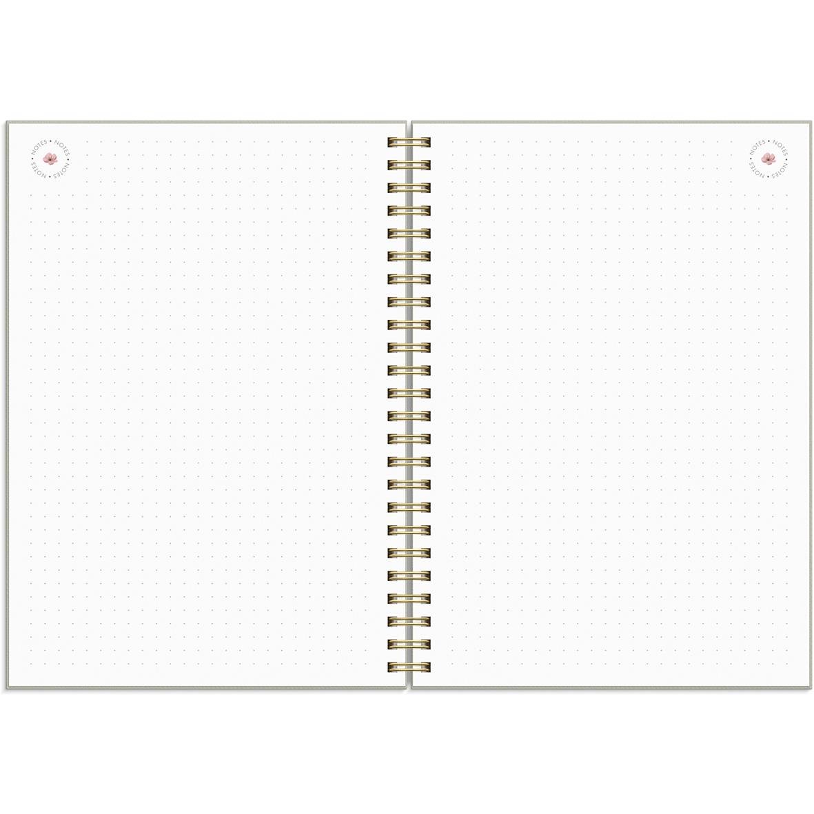 Öppnad A5-anteckningsbok med linjerade sidor och spiralrygg för planering och anteckningar