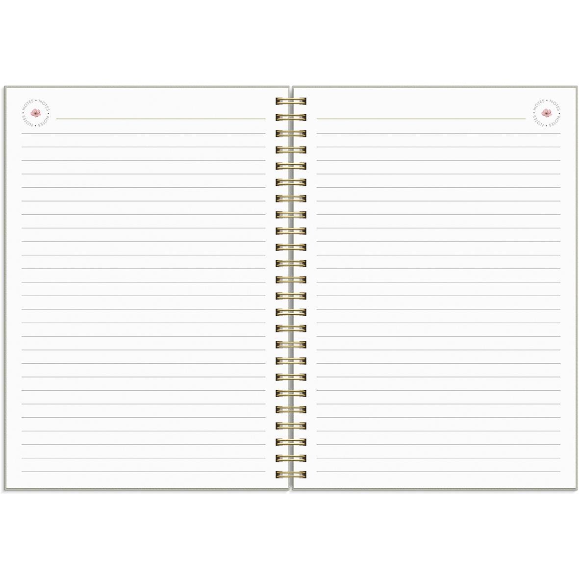 Öppnat A5 livsplanerare med guldspiral och rutade sidor för 2025-2026