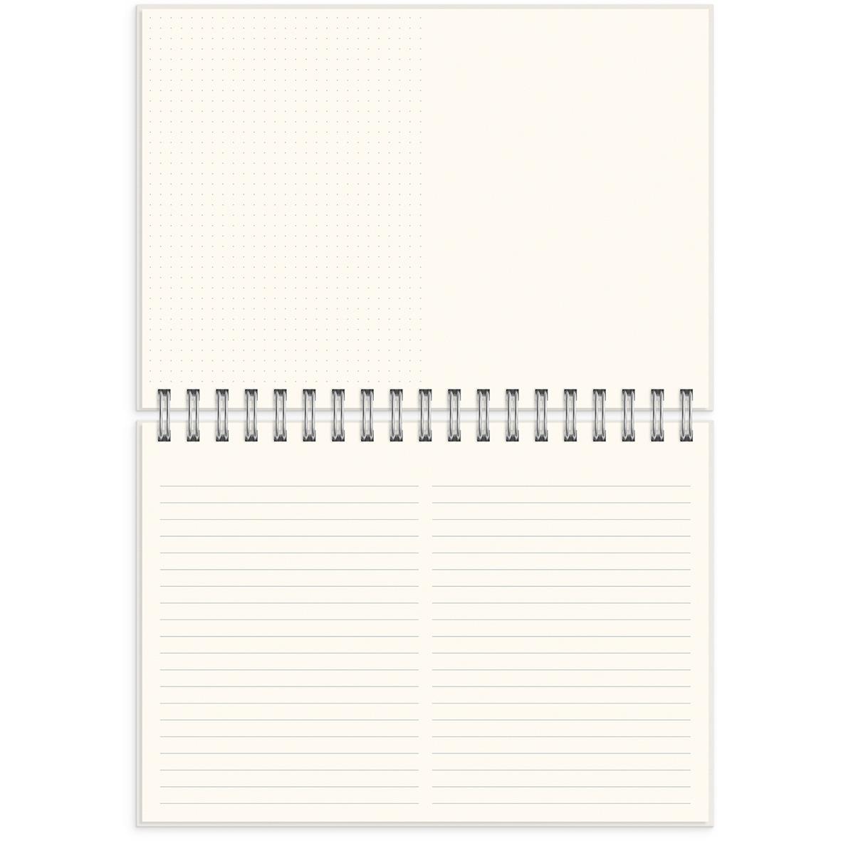 Öppen almanacka med spiralbindning och tomma sidor för reflektion och anteckningar