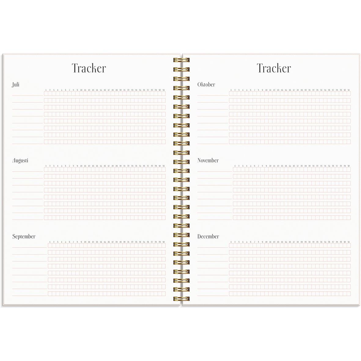 Rosa A5 Life Planner för 2024 med plats för att skriva ner mål och planer, öppnad för juli till december.