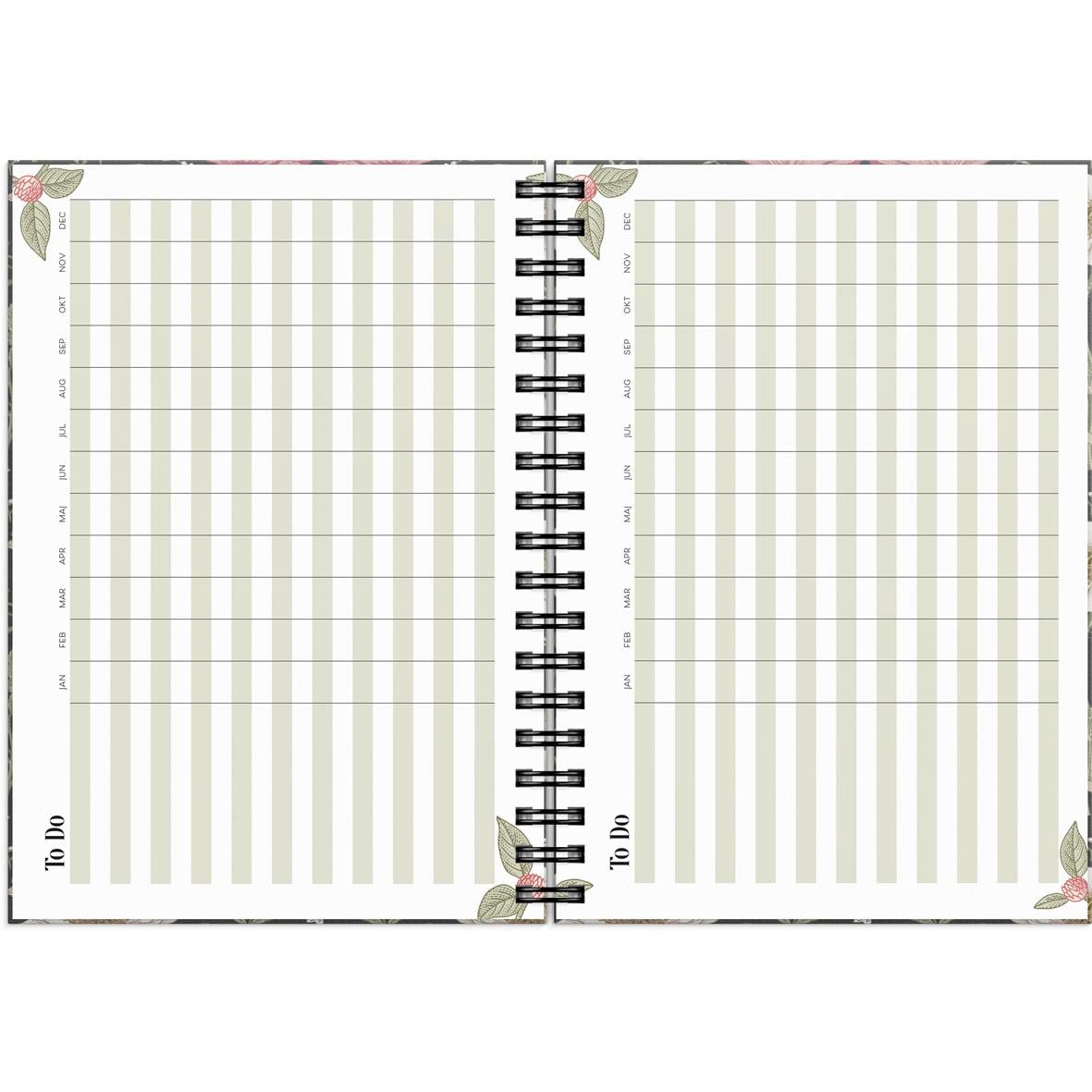Öppen planeringskalender för 2026 med blommönster och plats för att skriva att göra-listor och scheman