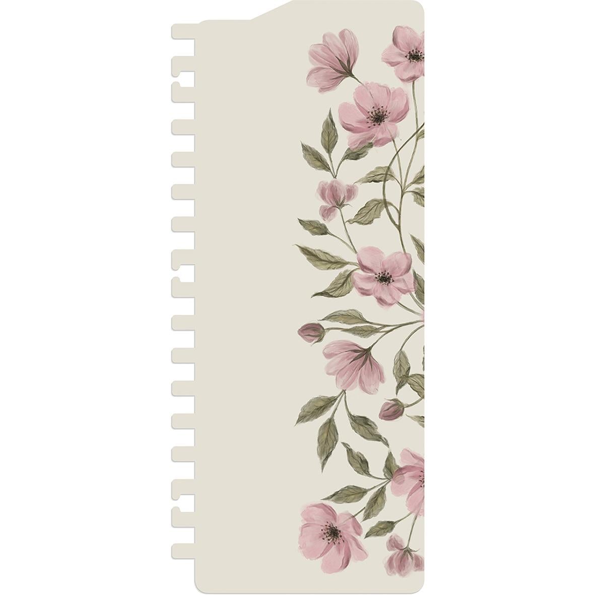 A6 livsplanerare med blommönster i rosa och grönt på beige bakgrund