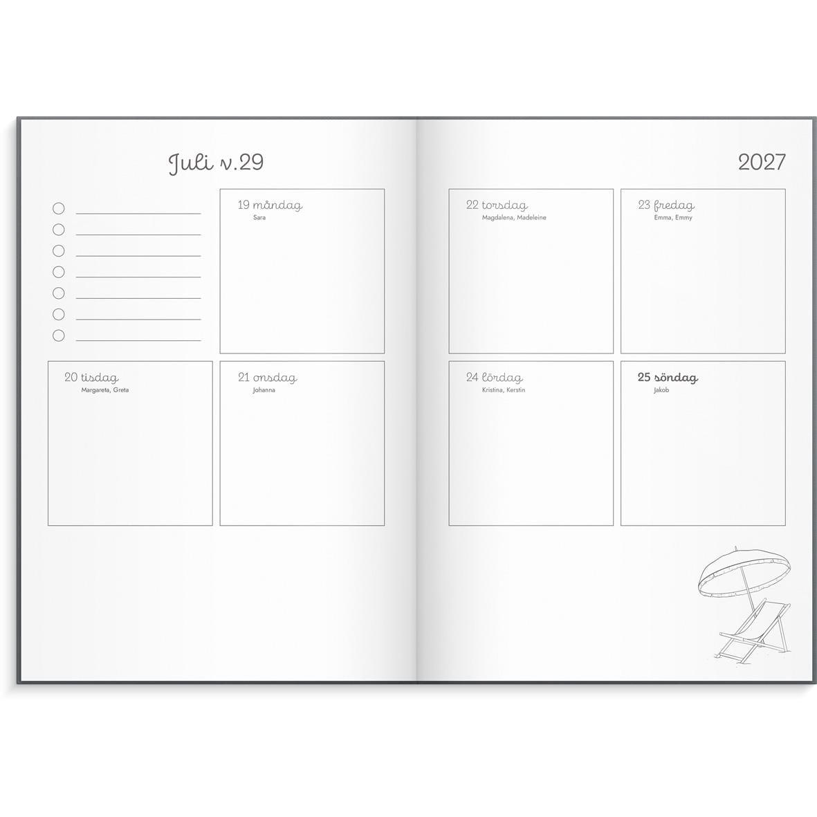 Öppnad almanacka för 2026 med april månad och kalender på två sidor