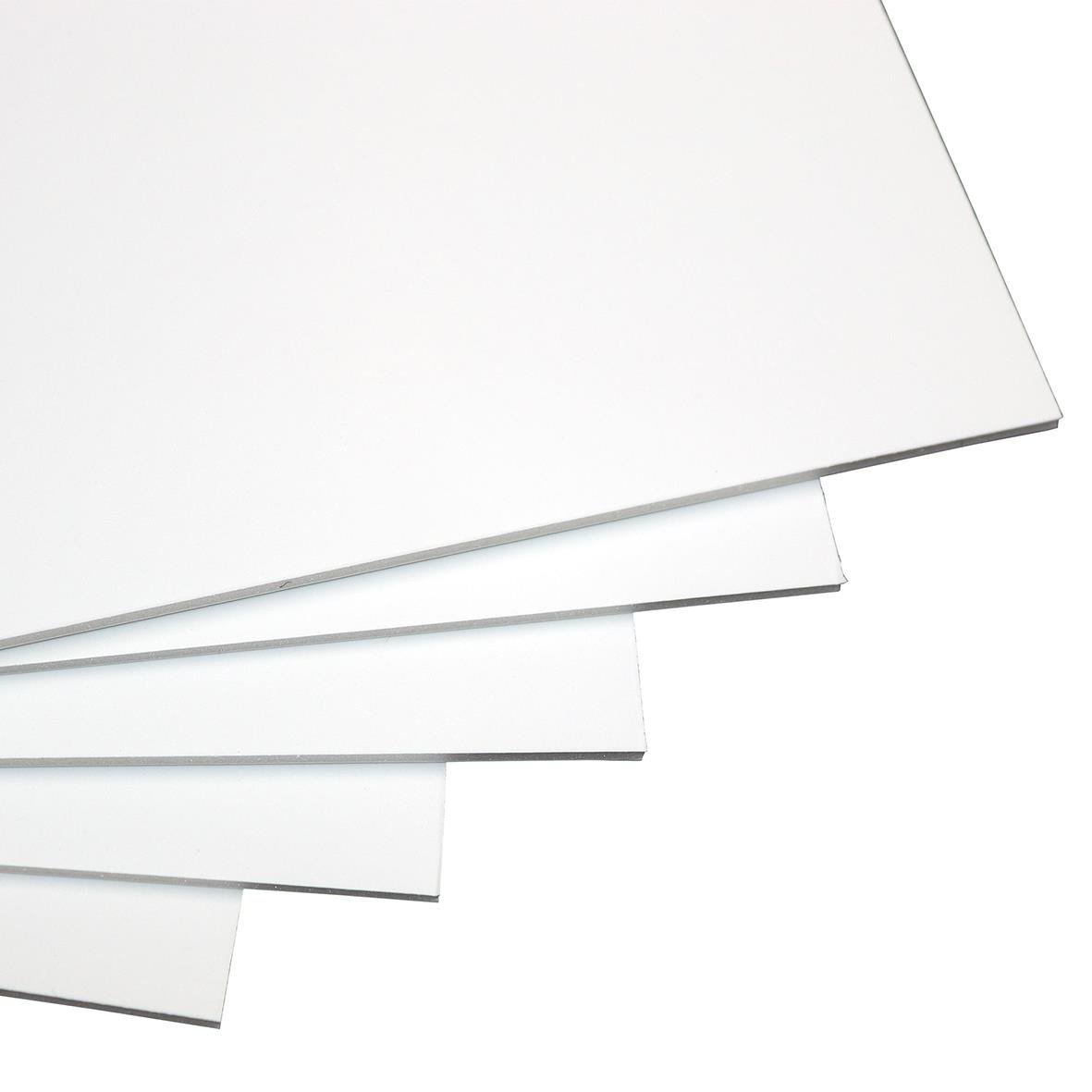 Vit kapaskiva 3mm tjock, 50x70cm, staplade på varandra