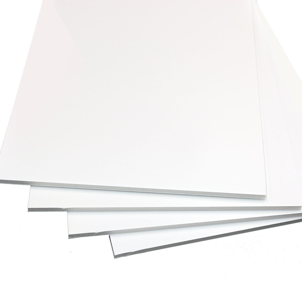 Vit kapaskiva 5mm tjock, 50x70cm, staplade på varandra