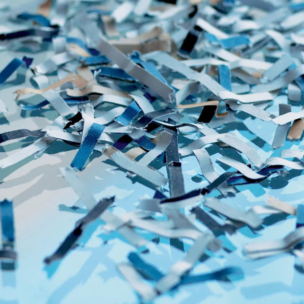 Krossade papperstrimlor från dokumentförstörare Dahle Volume Pro 419 P4