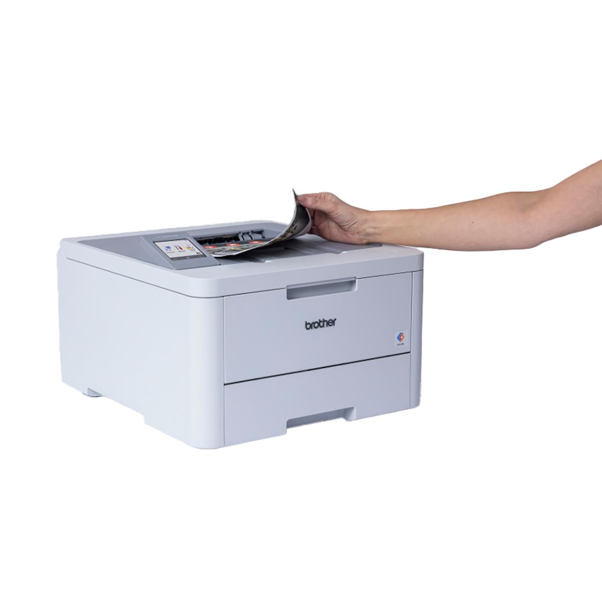 Färglaserskrivare Brother HL-L8230CDW med hand som placerar papper