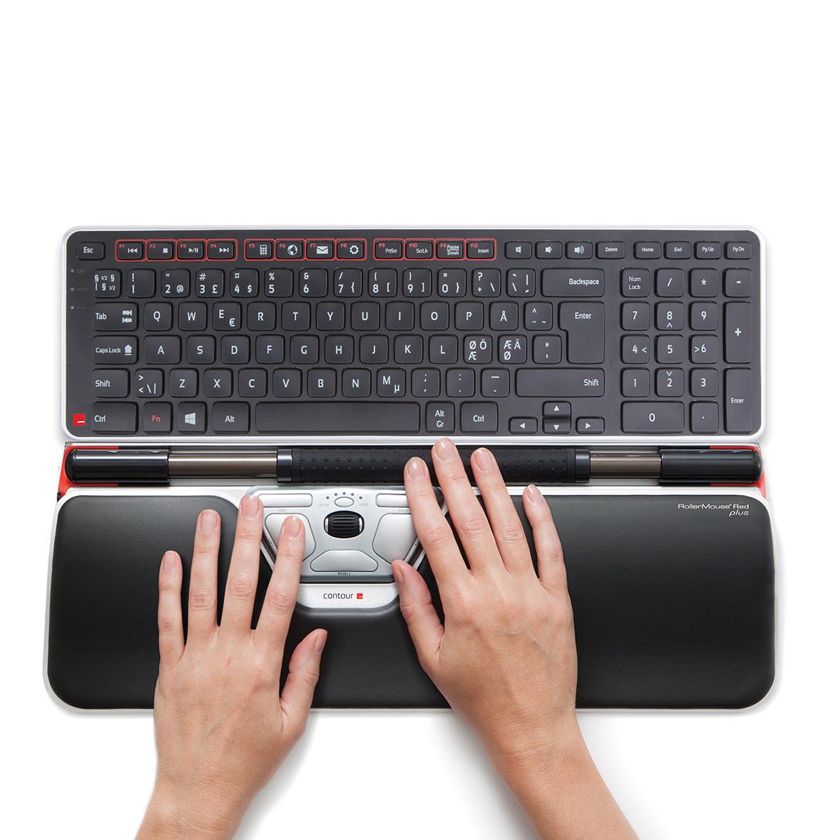 Trådlöst tangentbord Contour Balance med handledsstöd och en hand som använder det