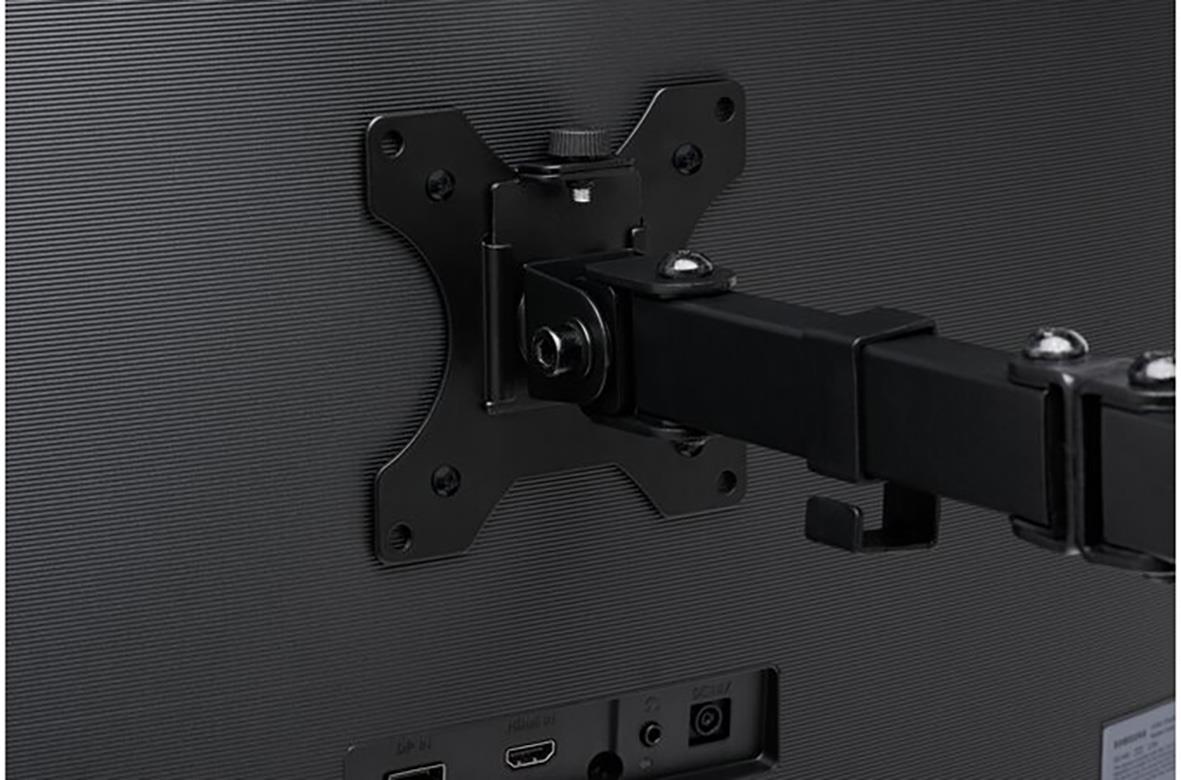 Dubbelt monitorarm Kensington SmartFit Ergo monterad på baksidan av en skärm