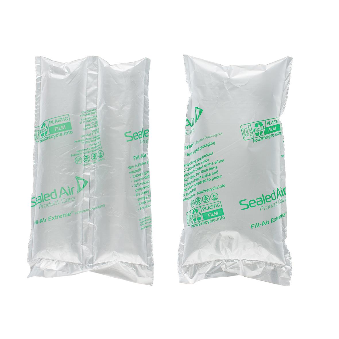 Två perforerade luftfyllda plastpåsar med gröna etiketter, storlek 200mm x 1280m, förslutna och vikta