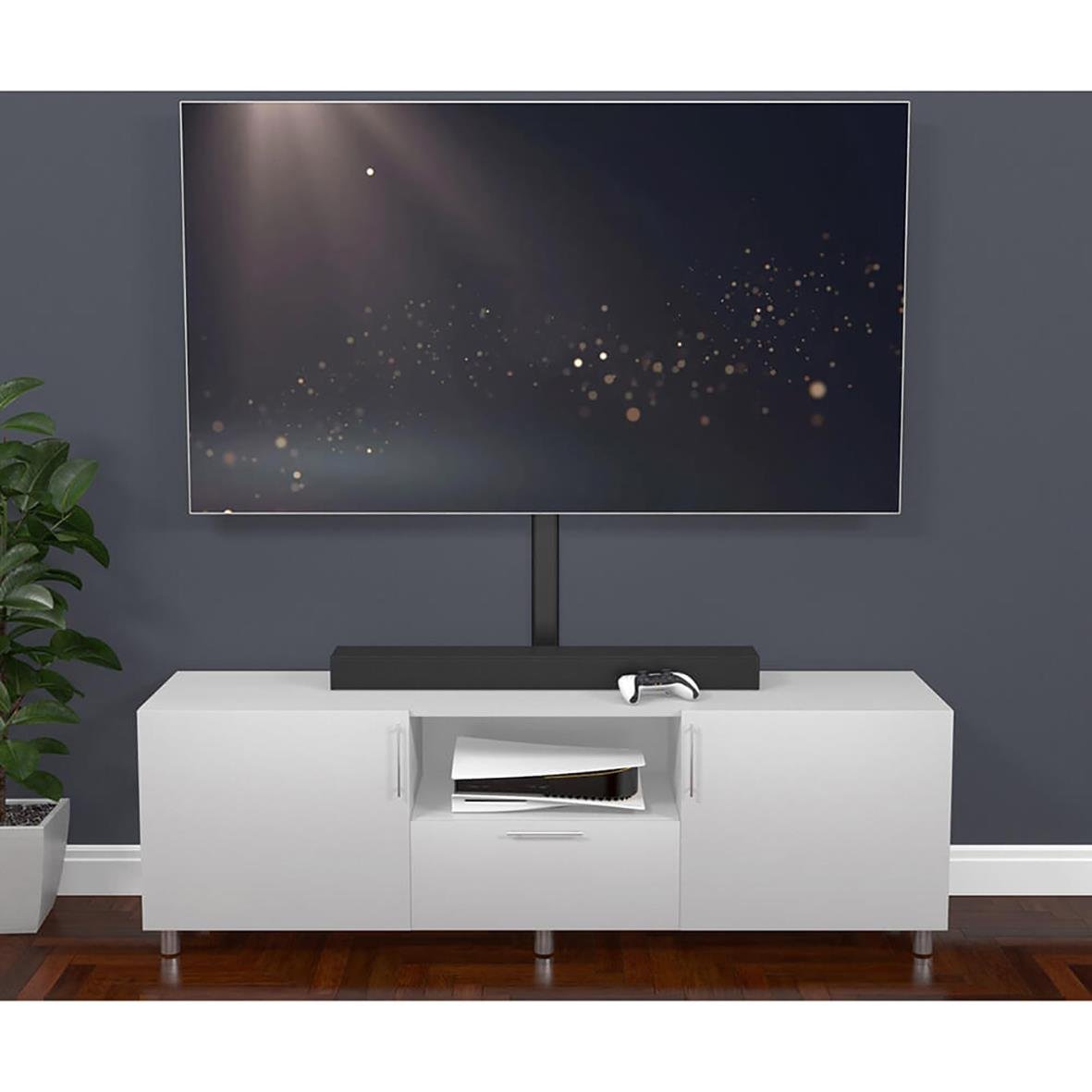 Svart kabelkanal D-LINE 60x15cm på en vit TV-bänk framför en vägg