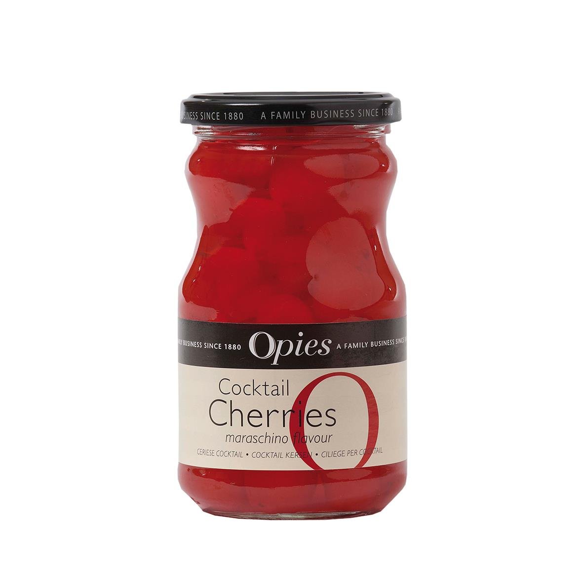 Röd cocktailbär i glasburk med svart lock och etikett som säger Cocktailbär Cherry