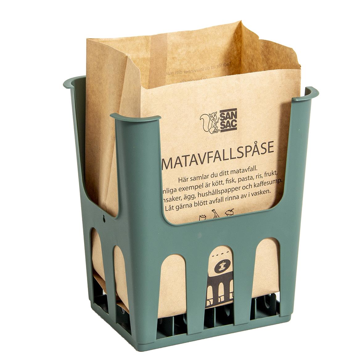 Matavfallskorg i plast med brunt matavfallspåse och informationstext