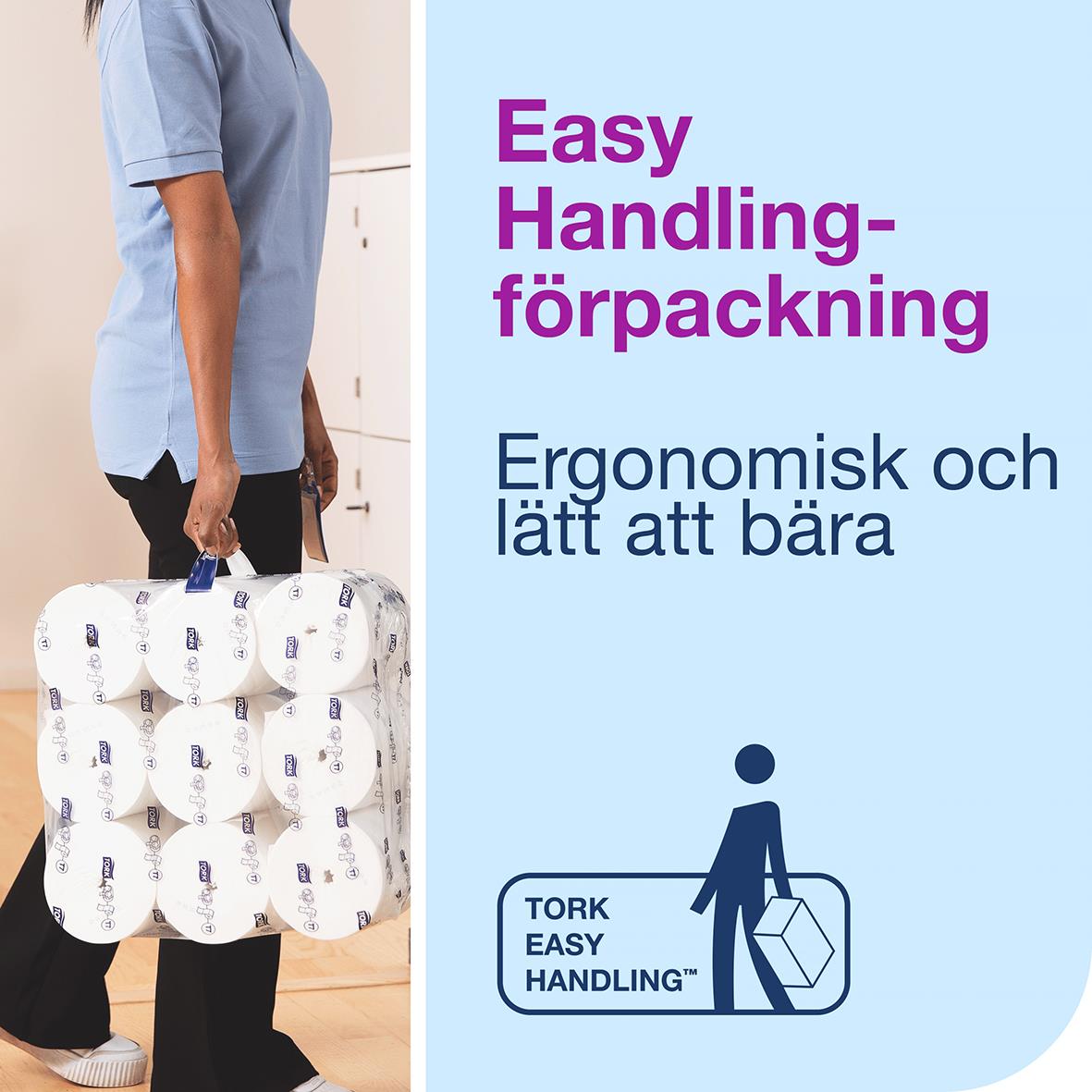 Person bär en stor packning med Tork T7 Coreless toalettpapper, ergonomisk och lätt att bära, på ett sjukhus eller vårdmiljö