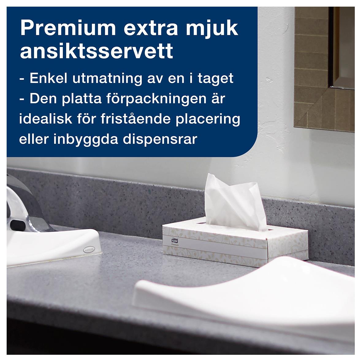 Förpackning av Tork F1 Premium Facial Extra Mjuk ansiktsservett på badrumsskrivbord