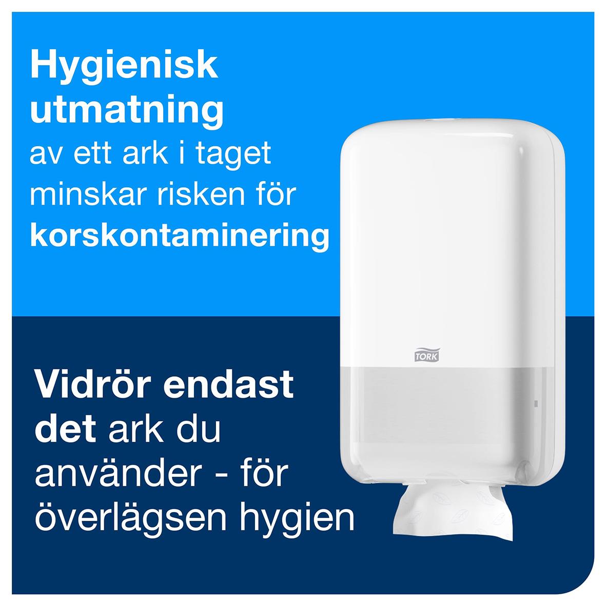 Vit dispenser för toalettpapper Tork T3 med hygienisk utmatning och skydd för överlägsen hygien