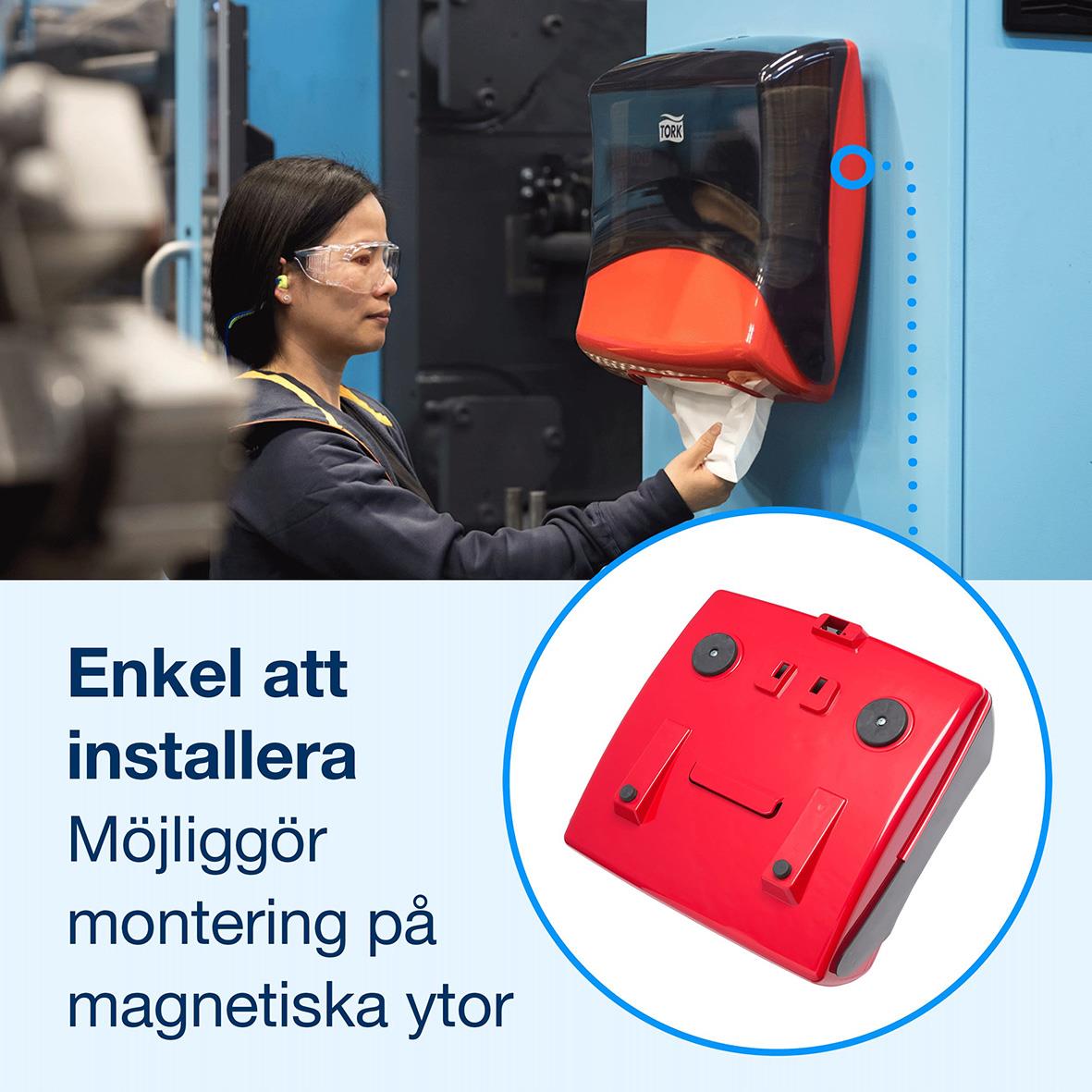 Kvinna monterar ett magnetiskt torkskåp med monteringskit Magnet Tork W4 Magnetkit, enkelt att installera på magnetiska ytor