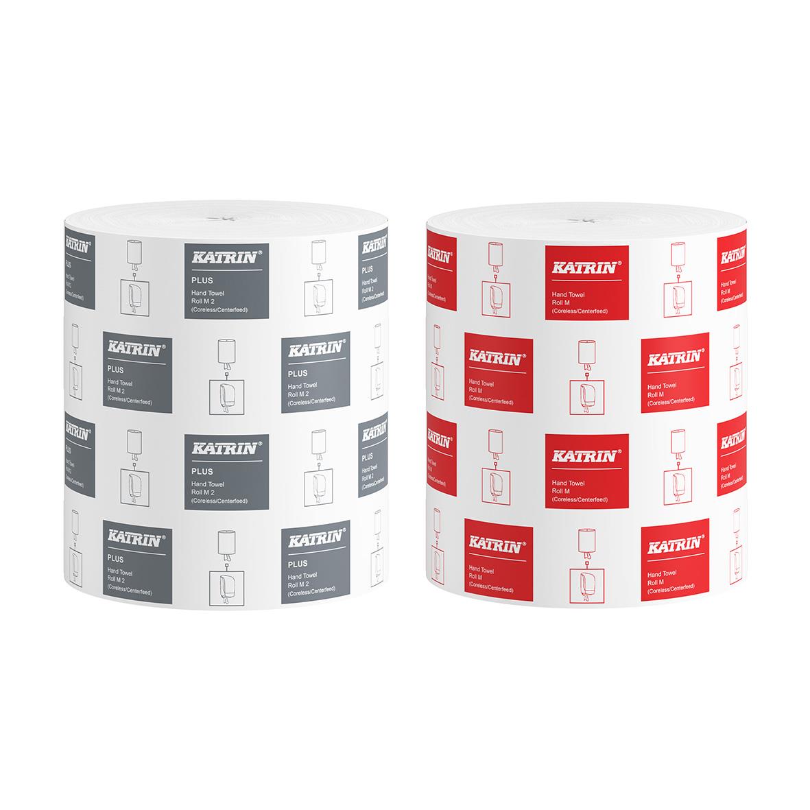 Två rulldispensrar för Katrin Centrummatad M, en vit och en röd, för handdukar