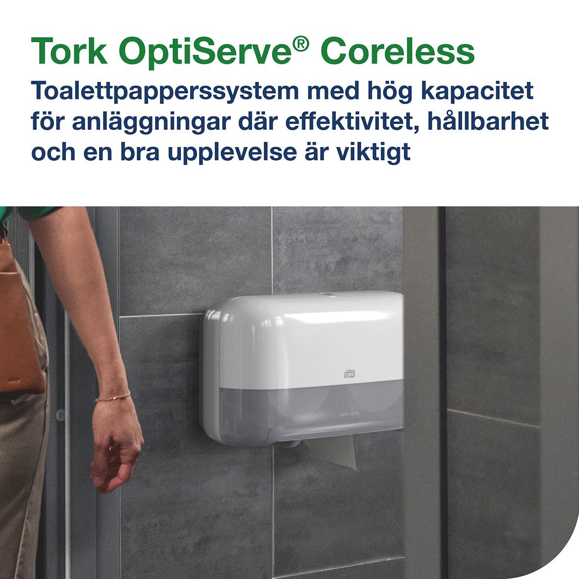 Vitt dispenser för toalettpapper Tork T7 Coreless med två rullar på en vägg i ett badrum