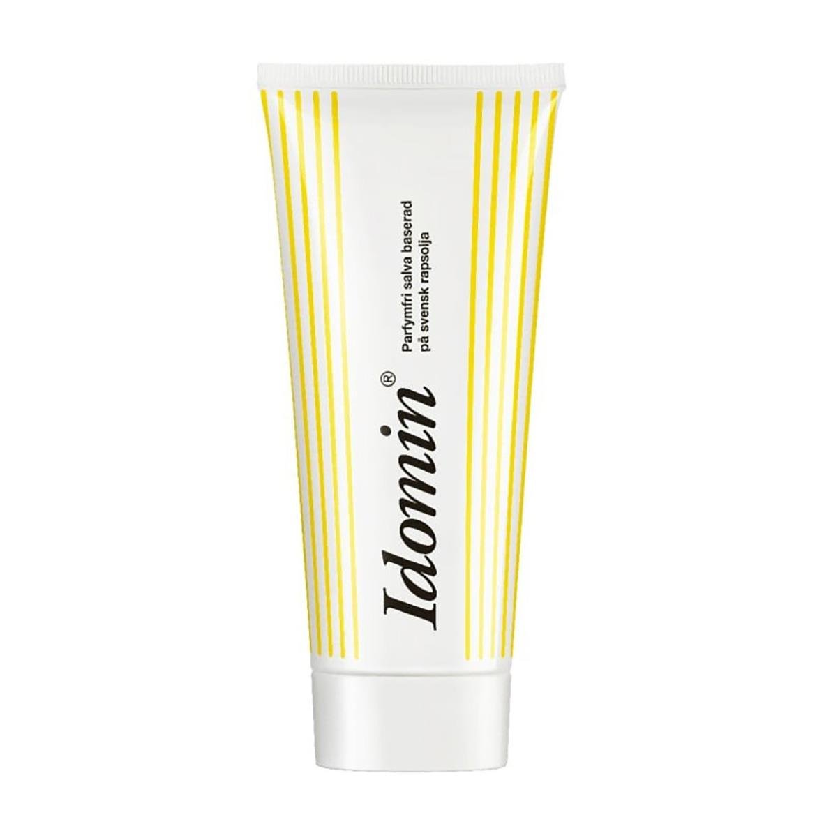 Hudsalva Idomin 100g i tub med vit och gul randig design