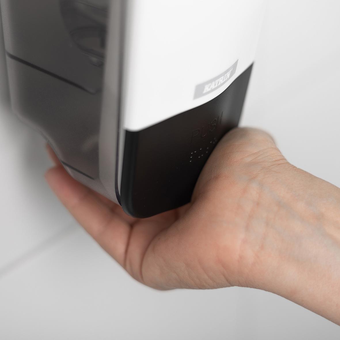 Handdesinfektionsautomat Katrin Alcogel 80 1L med hand under för att få gel