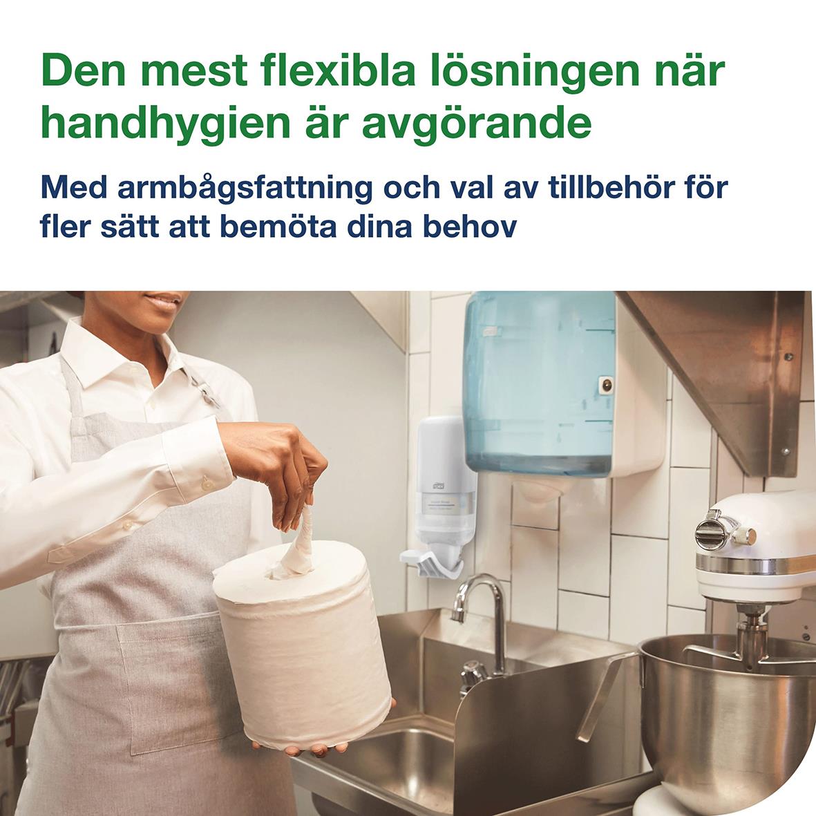 Vit dispenser Tork S4 med armbågsfattning för hygienvänlig användning i kök eller arbetsmiljö