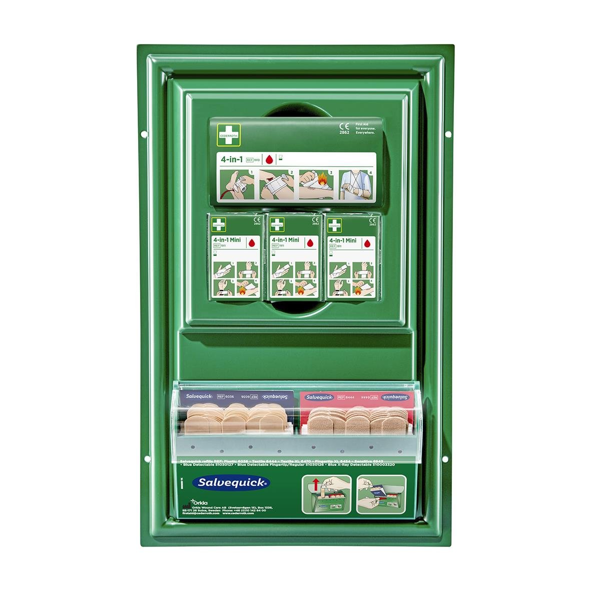 Första hjälpen station i grönt skåp med instruktioner och förbandsmaterial