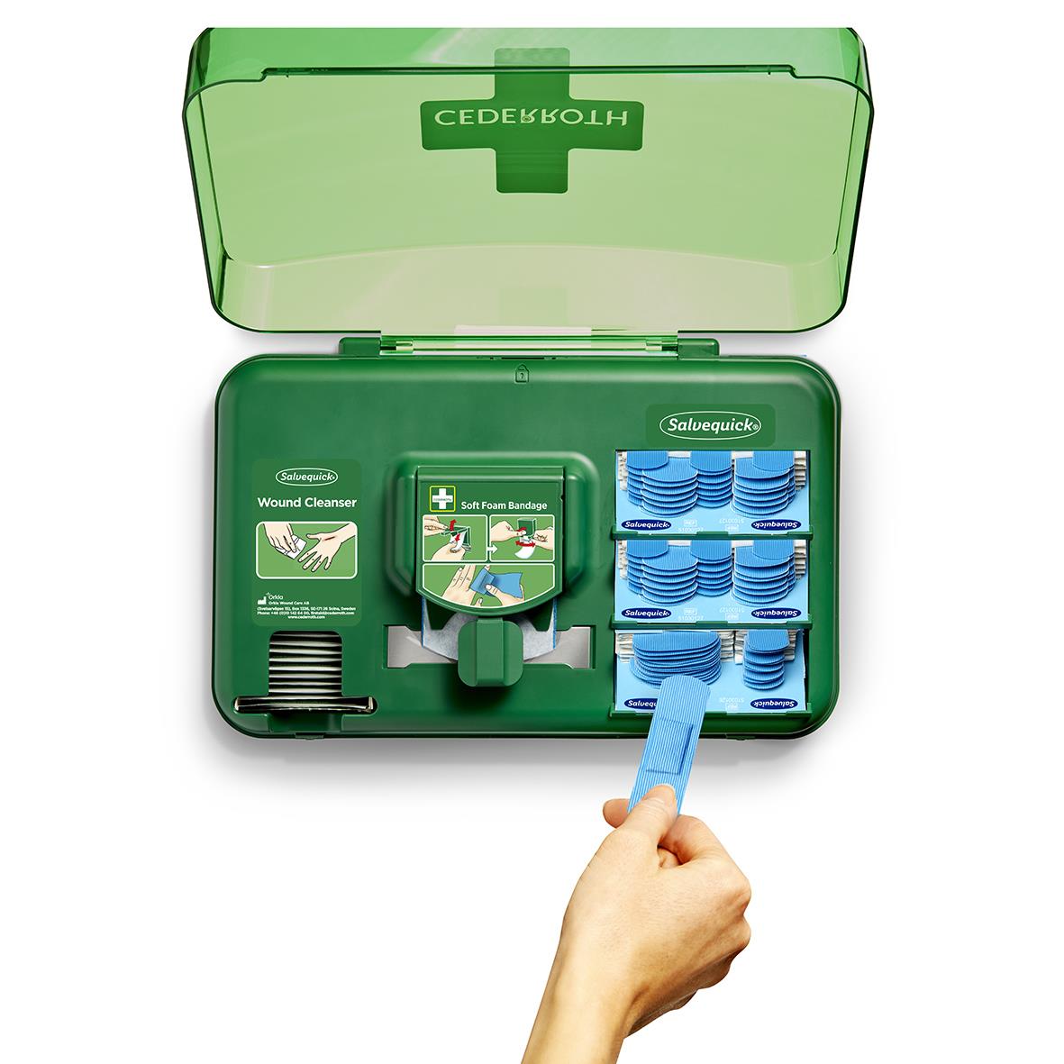 Första hjälpen Cederroth station med blå sårförband och rengöringsmedel