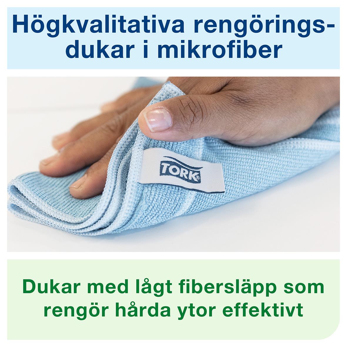 Mikrofiberduk Tork i rött, 30,5x30,5cm, visar en hand som torkar en yta