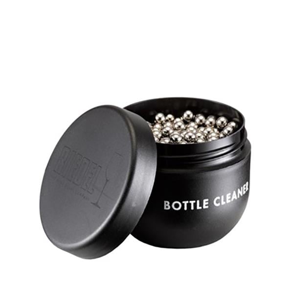 Karaffrengörare från Riedel i svart behållare med metallkulor