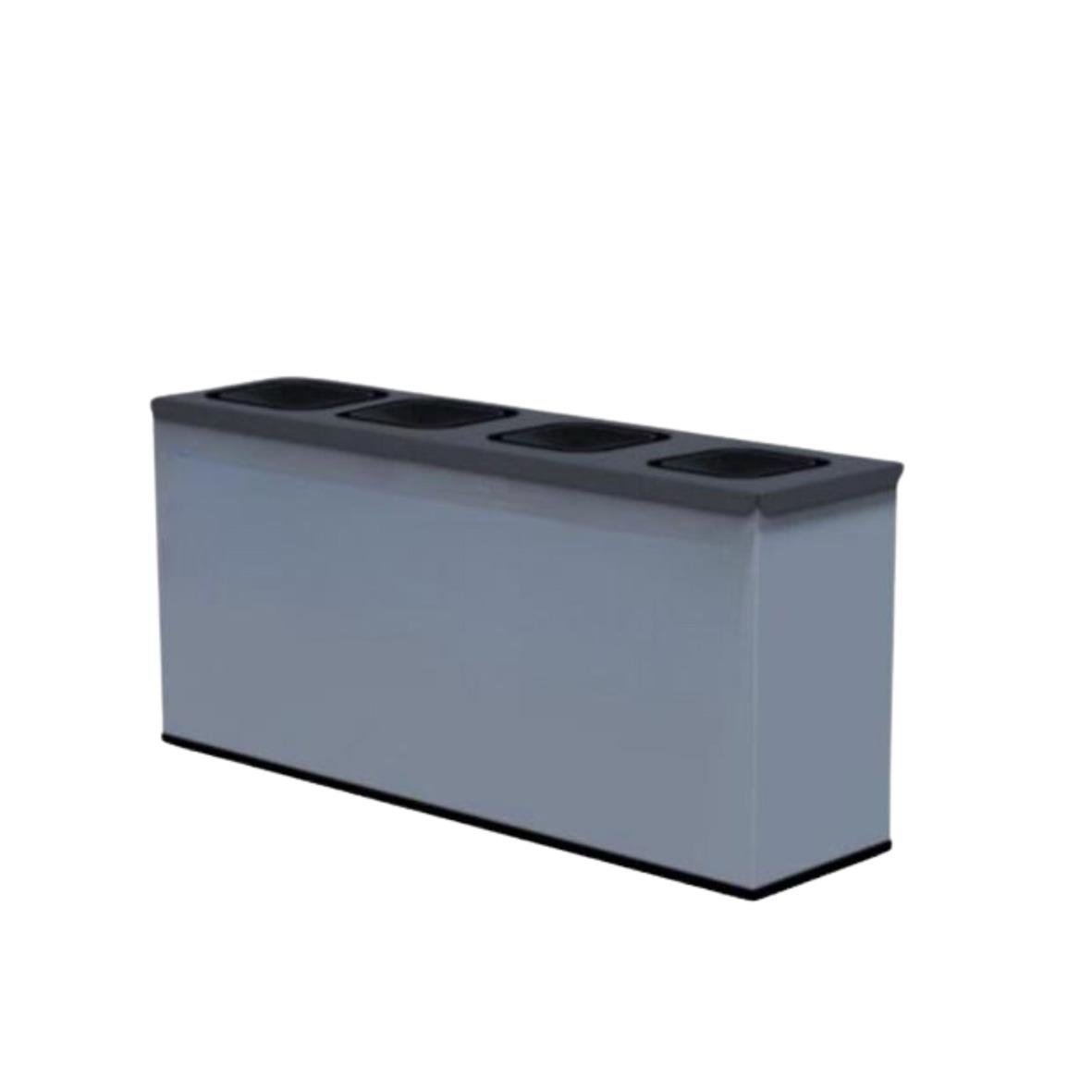 En lång, grå blomkruka med fyra hål för växter