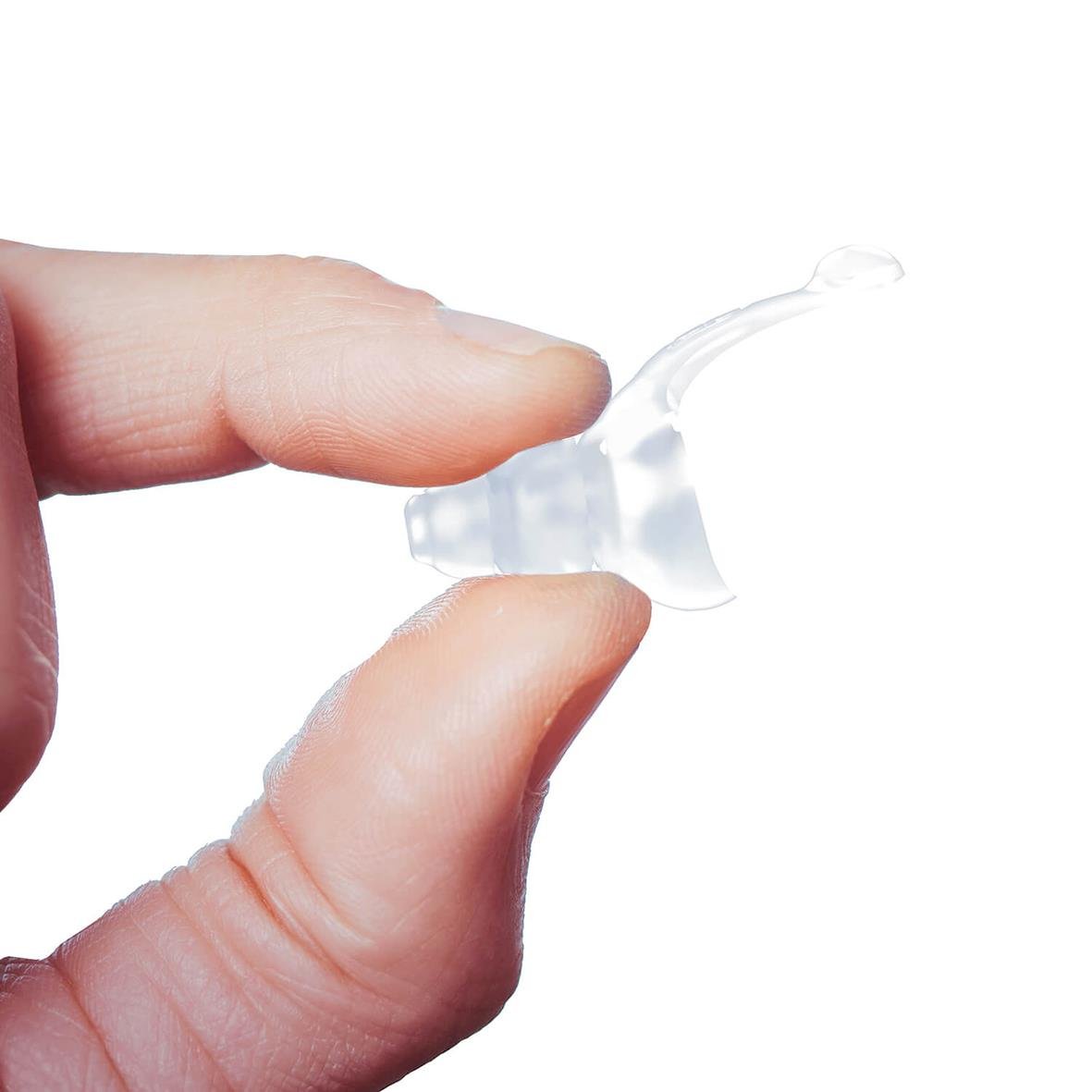 Hörselskydd Mixx Noise Protection Sleep i handen, transparent och liten