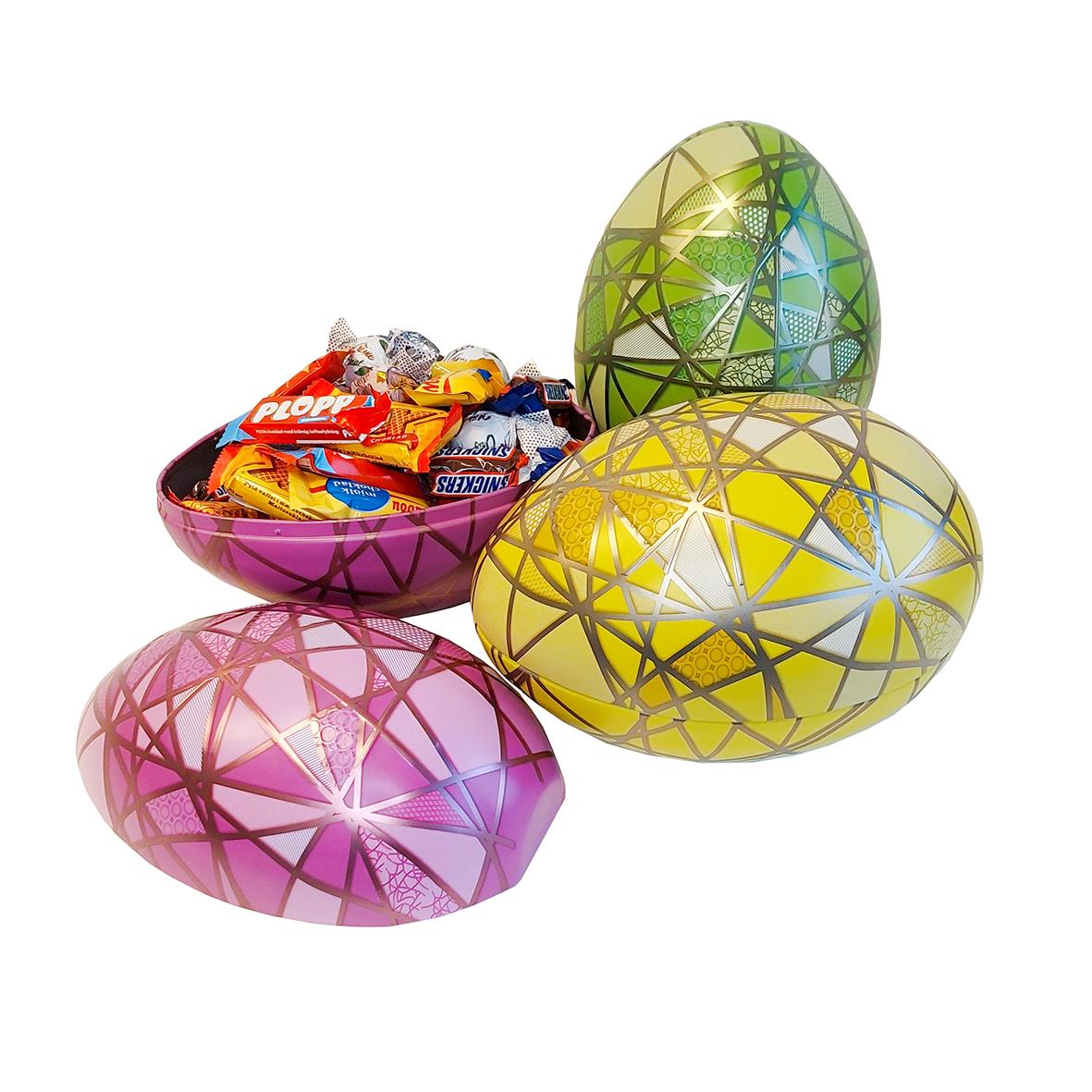 Färgglada påskägg fyllda med godis, i rosa, gul, grön och lila färger