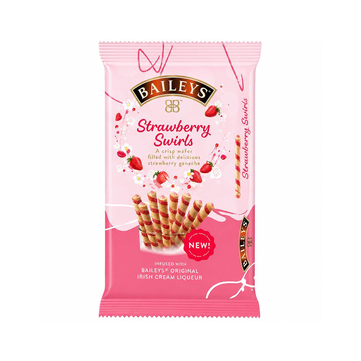 Baileys Strawberry Swirls godis i rosa förpackning med jordgubbar och glassrör